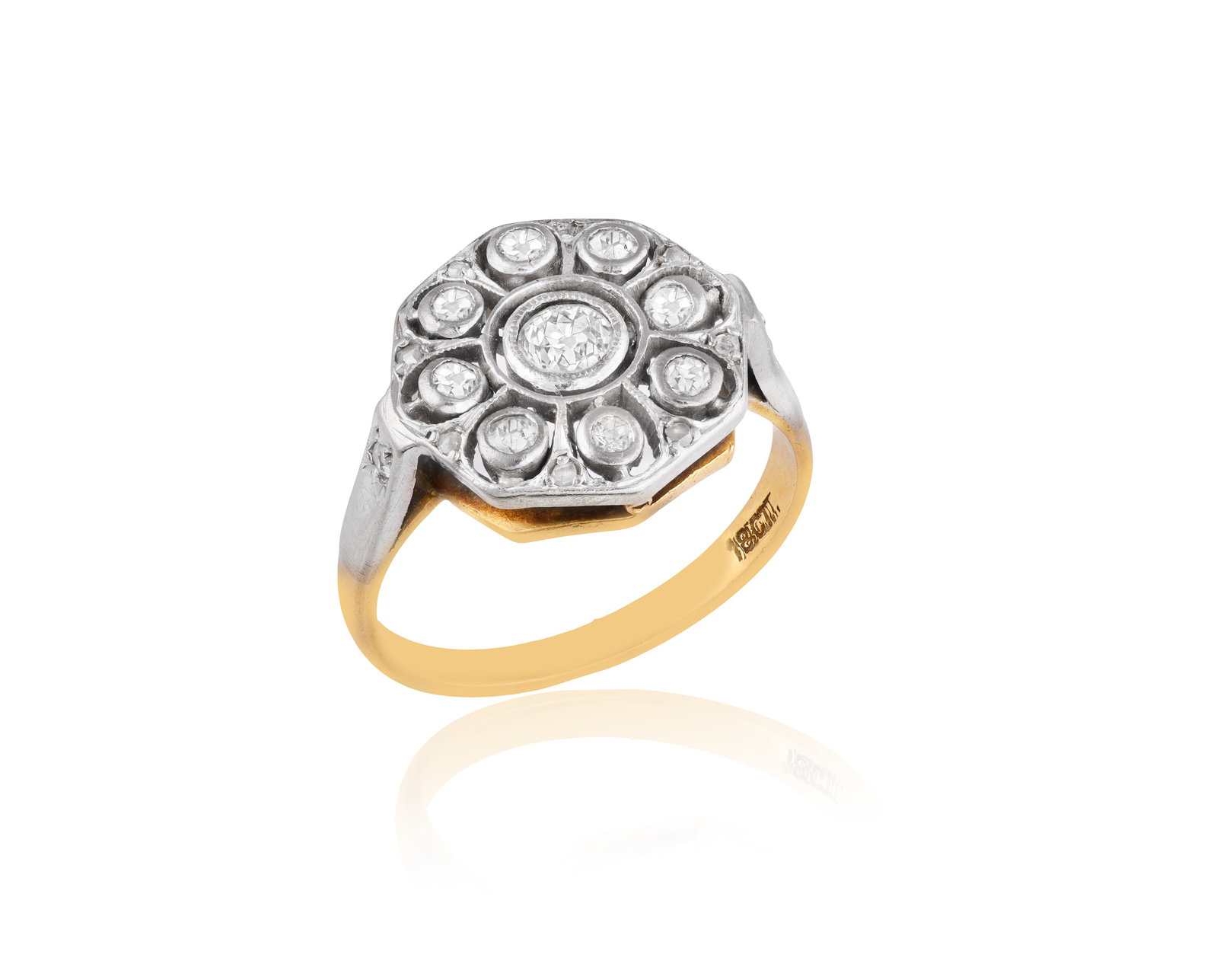 A DIAMOND CLUSTER RING • Old-brilliant-cut diamonds • mounted in 18K gold, silver and pa (1 of 2)