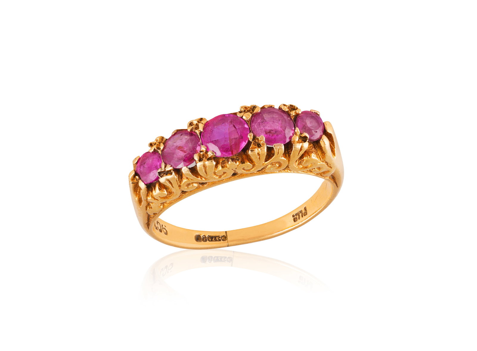 A LATE 19TH CENTURY SAPPHIRE FIVE-STONE RING • Set with circular-cut pink sapphires • (1 of 2)