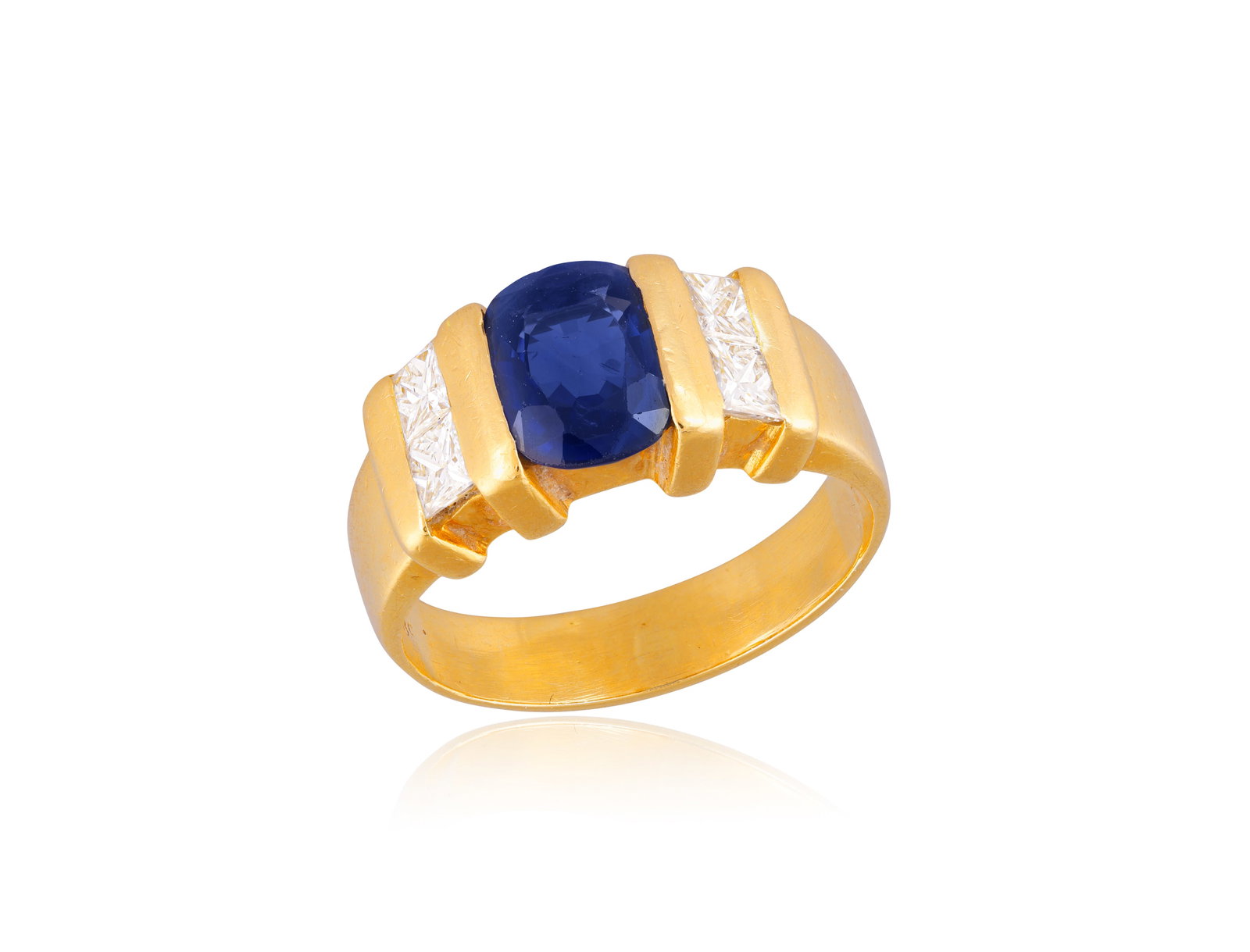 A SAPPHIRE AND DIAMOND RING • Cushion-shaped sapphire, approx. 1.40cts • princess-cut: A SAPPHIRE AND DIAMOND RING • Cushion-shaped sapphire, approx. 1.40cts • princess-cut diamonds • mounted in 18K gold • ring size M⅓