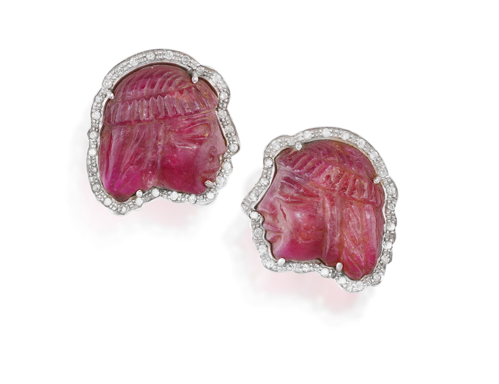 A PAIR OF CARVED RUBY AND DIAMOND EARRINGS • Each designed as a face in profile • single (1 of 2)