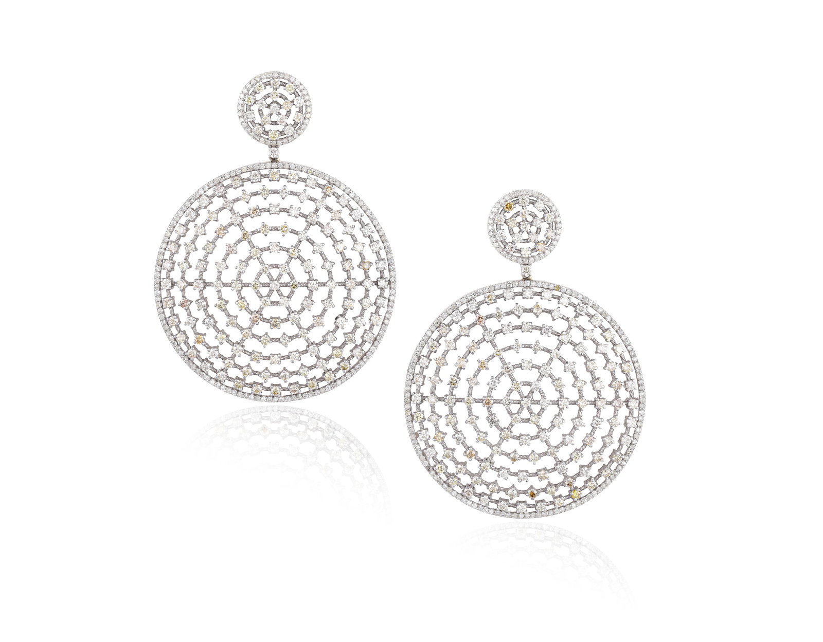 A PAIR OF DIAMOND PENDENT EARRINGS • Of openwork circular design • brilliant and single- (1 of 2)