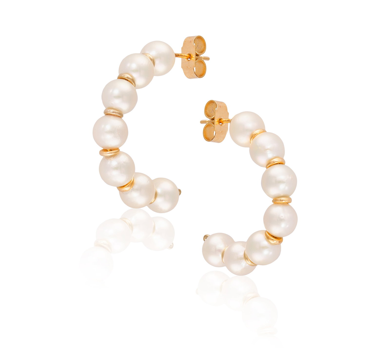 A PAIR OF CULTURED PEARL HOOP EARRINGS • Cultured pearls of white tint • mounted in 9K g (1 of 2)