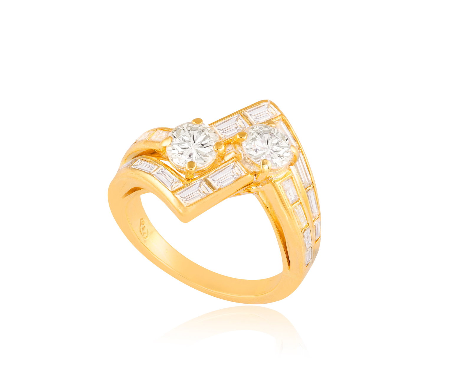 A DIAMOND CROSSOVER RING • Brilliant and baguette-cut diamonds, approx. 2.60cts total • (1 of 2)