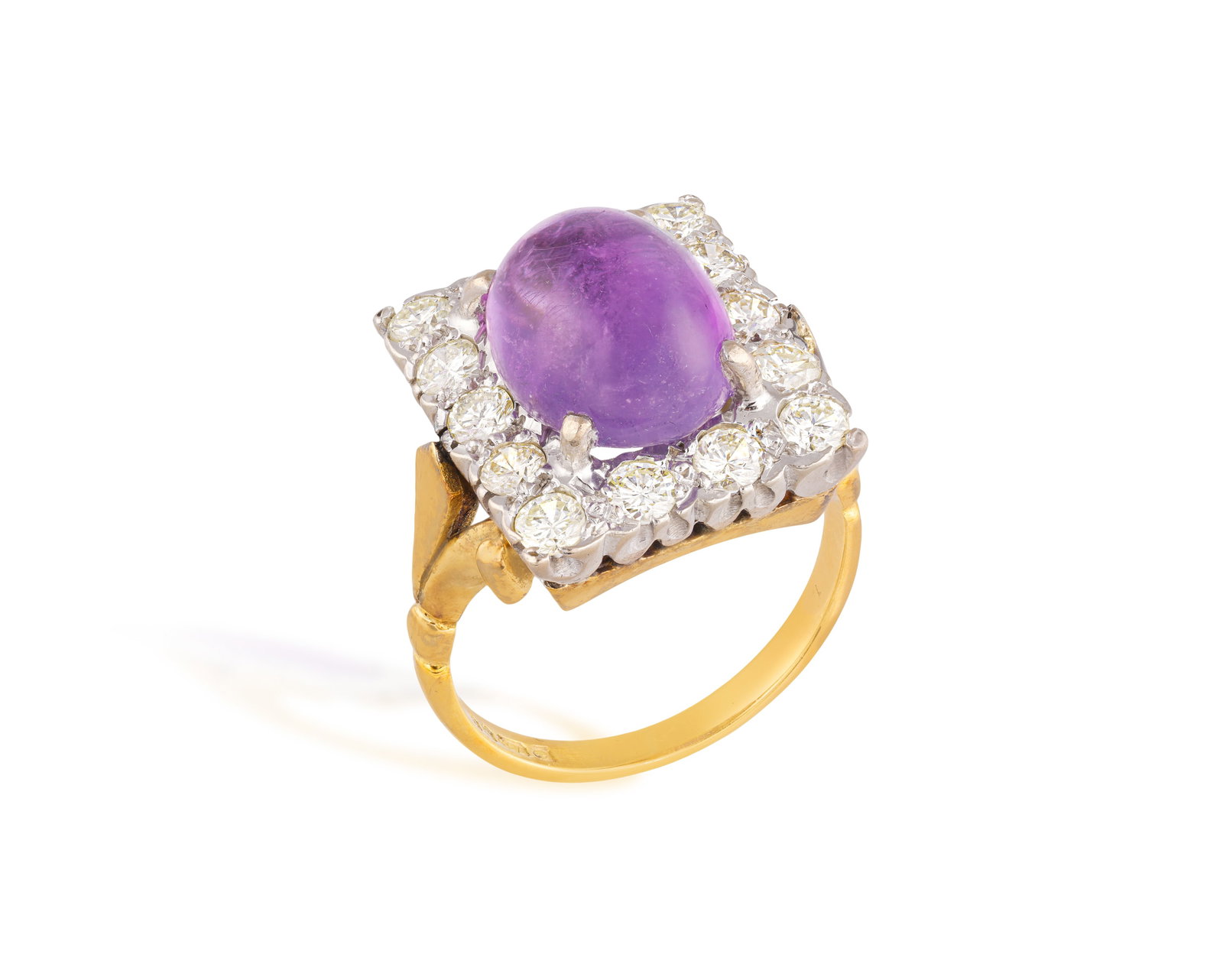 AN AMETHYST AND DIAMOND DRESS RING • Oval-shaped amethyst cabochon, approx. 4.50cts • br (1 of 2)
