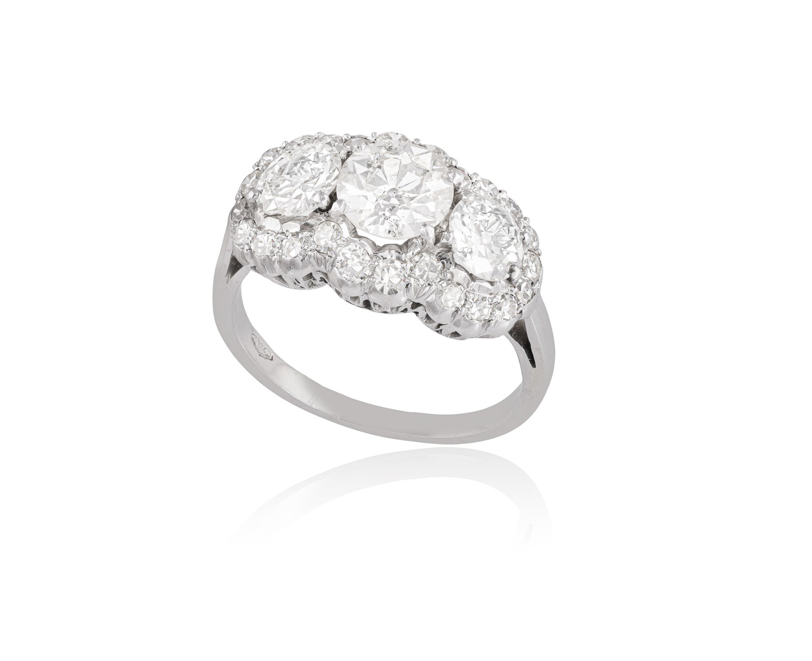 A DIAMOND THREE-STONE RING • Set with old brilliant and single-cut diamonds, approx. 3.30cts: A DIAMOND THREE-STONE RING • Set with old brilliant and single-cut diamonds, approx. 3.30cts total • mounted in 18K gold • ring size Q½