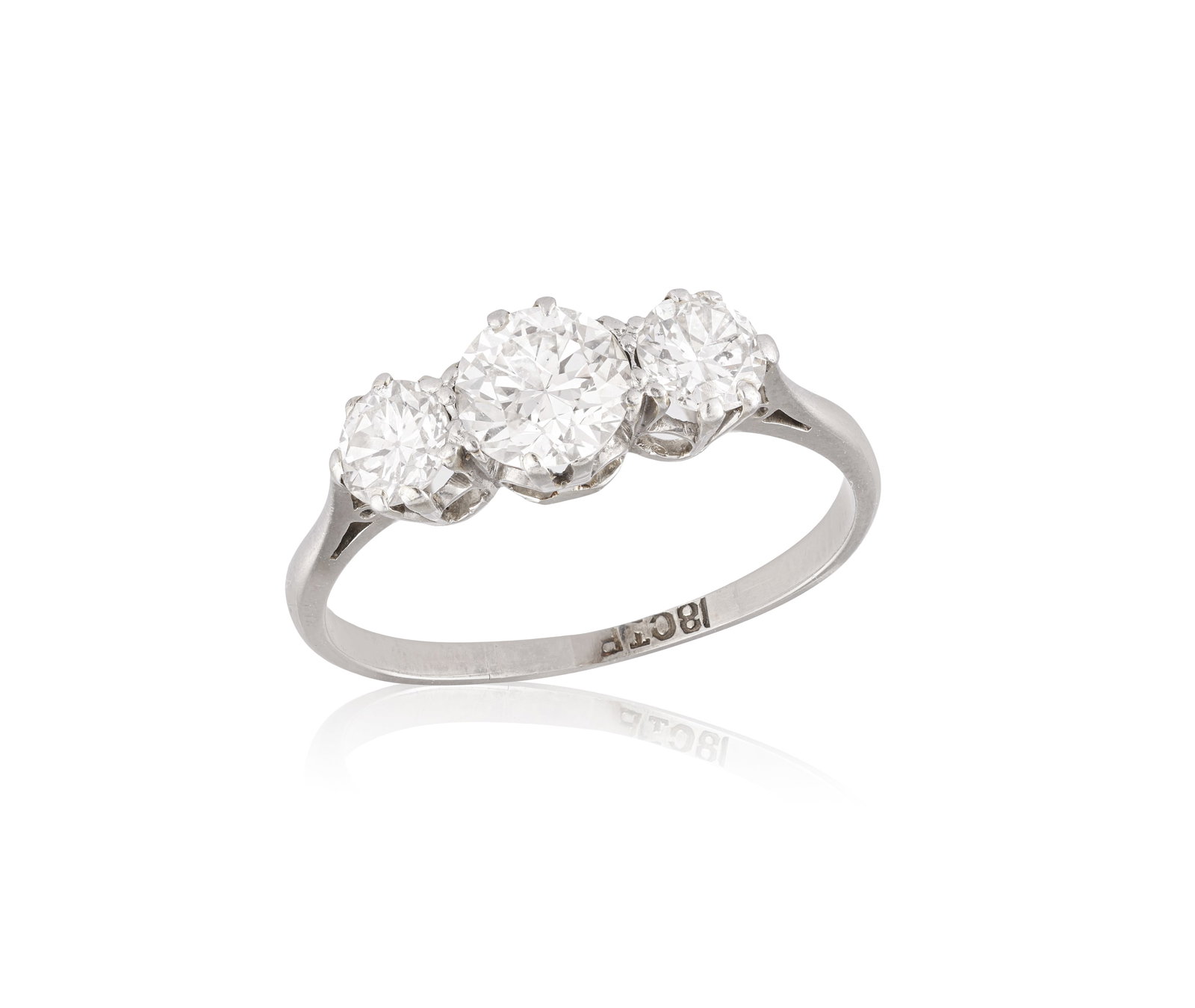 A DIAMOND THREE-STONE RING • Three old brilliant-cut diamonds, approx. 1.30cts total • m (1 of 2)