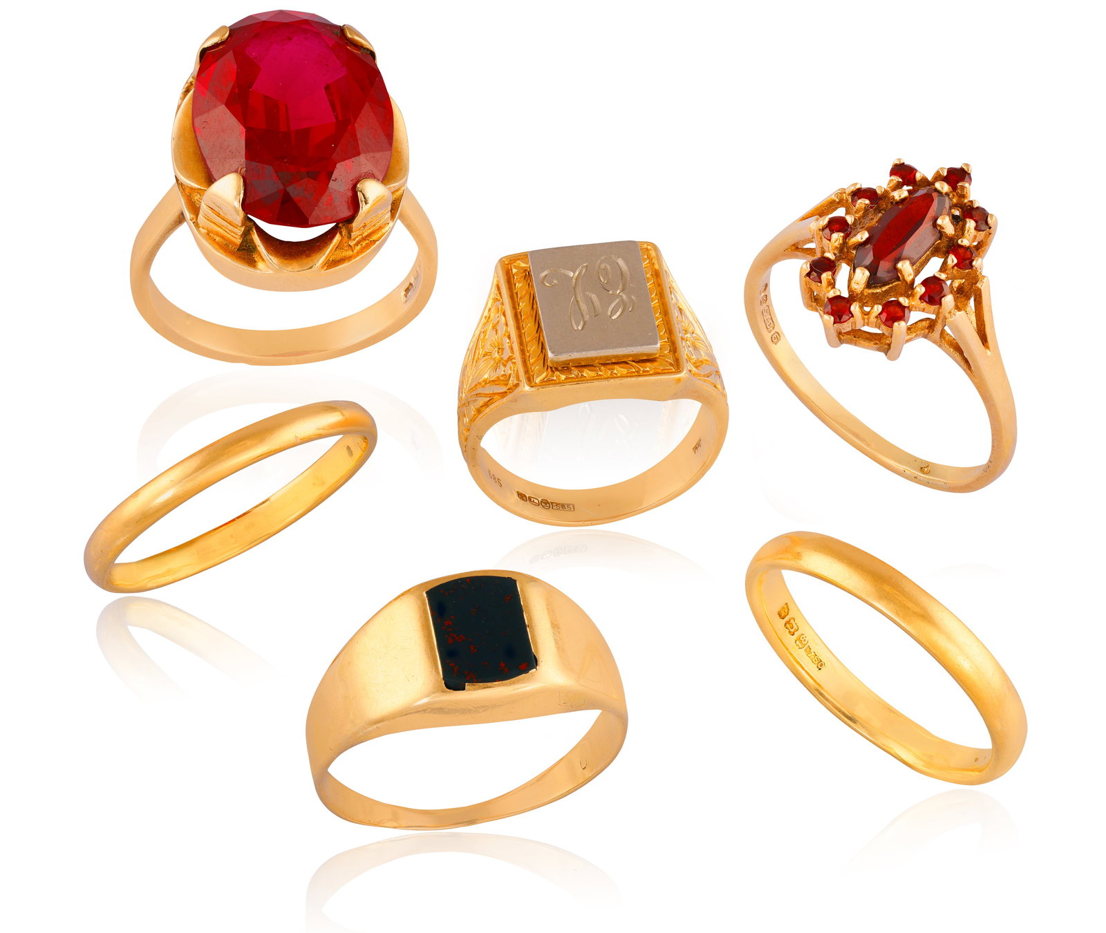 A GROUP OF SIX RINGS • The first: oval-shaped synthetic ruby ring, approx. 13.80cts • (1 of 6)