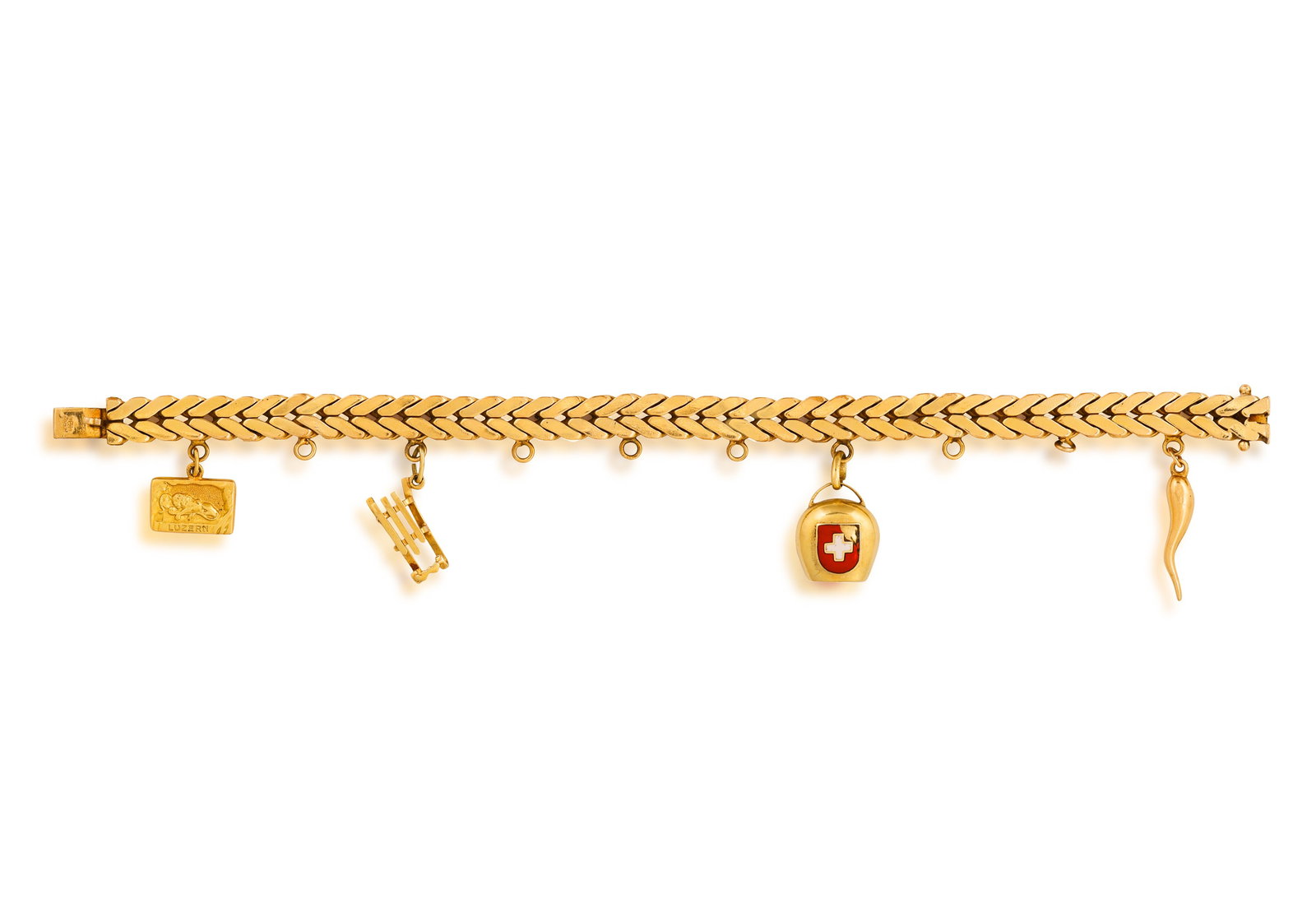 A GOLD CHARM BRACELET • Flattened wheat-link chain • suspending four various charms: A GOLD CHARM BRACELET • Flattened wheat-link chain • suspending four various charms • length 18.5cm * This lot is sold without a reserve