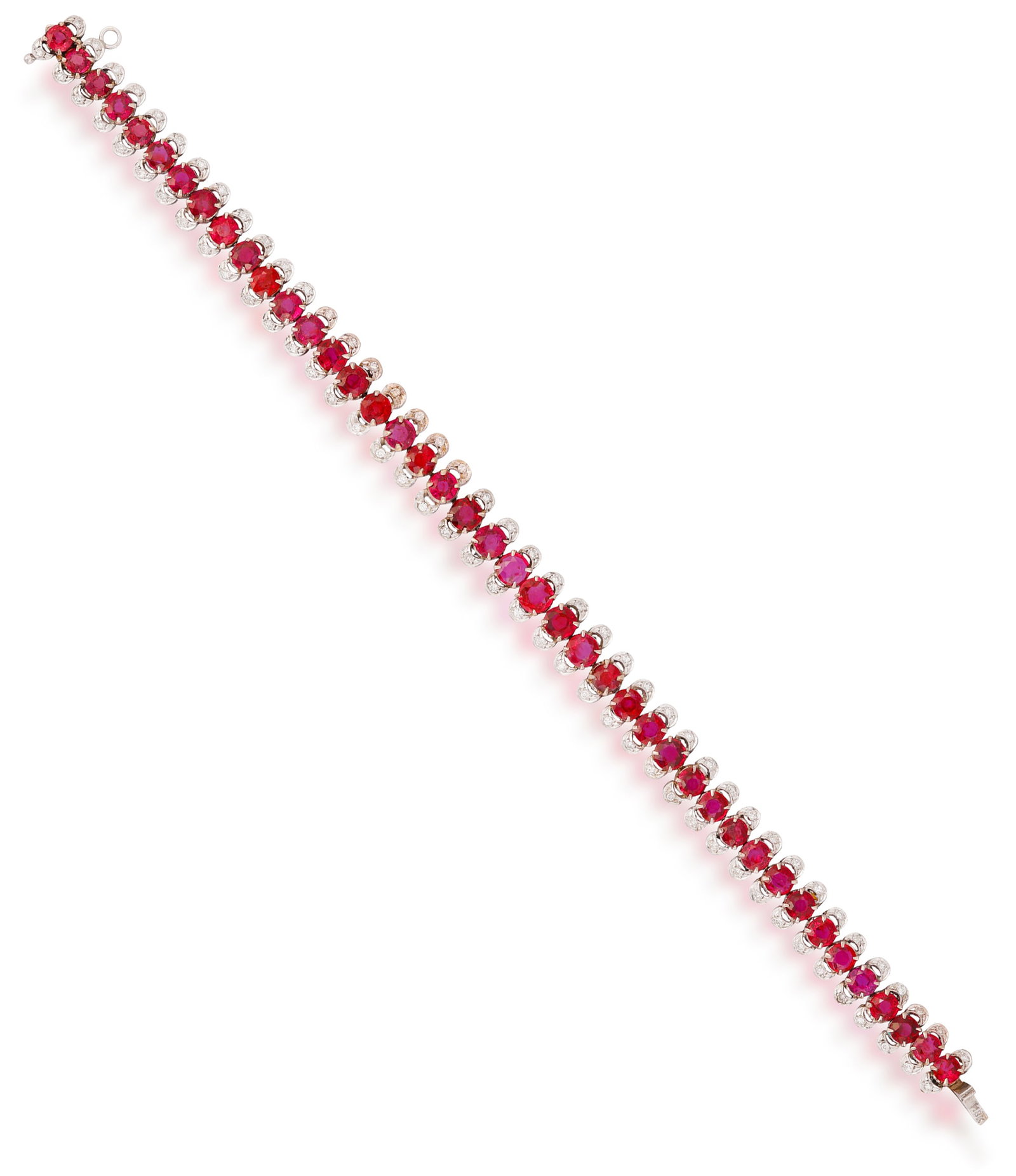 A RUBY AND DIAMOND LINE BRACELET • Circular-cut rubies, approximately 8.40cts total •: A RUBY AND DIAMOND LINE BRACELET • Circular-cut rubies, approximately 8.40cts total • brilliant-cur diamonds • with security chain • mounted in 18K gold • length 19cm