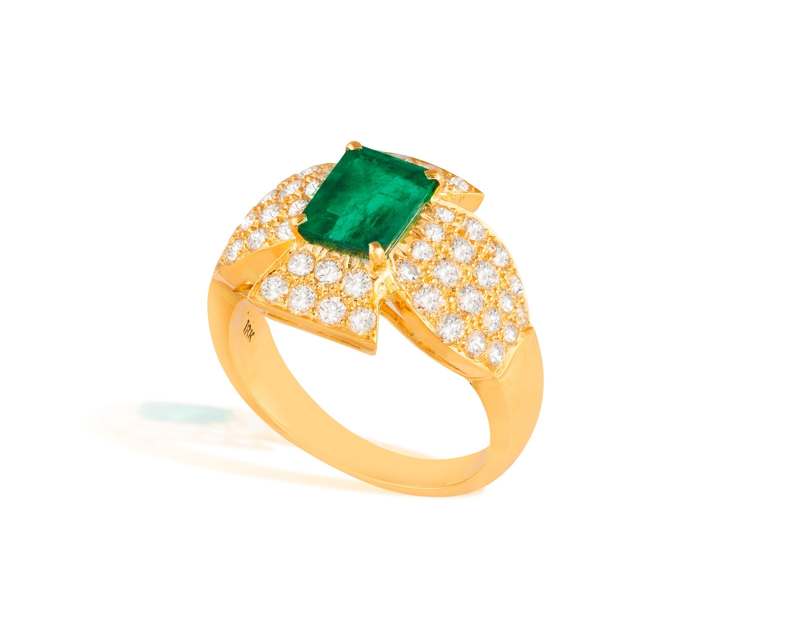 AN EMERALD AND DIAMOND RING • Rectangular-shaped emerald, approx. 1.50cts • - 2