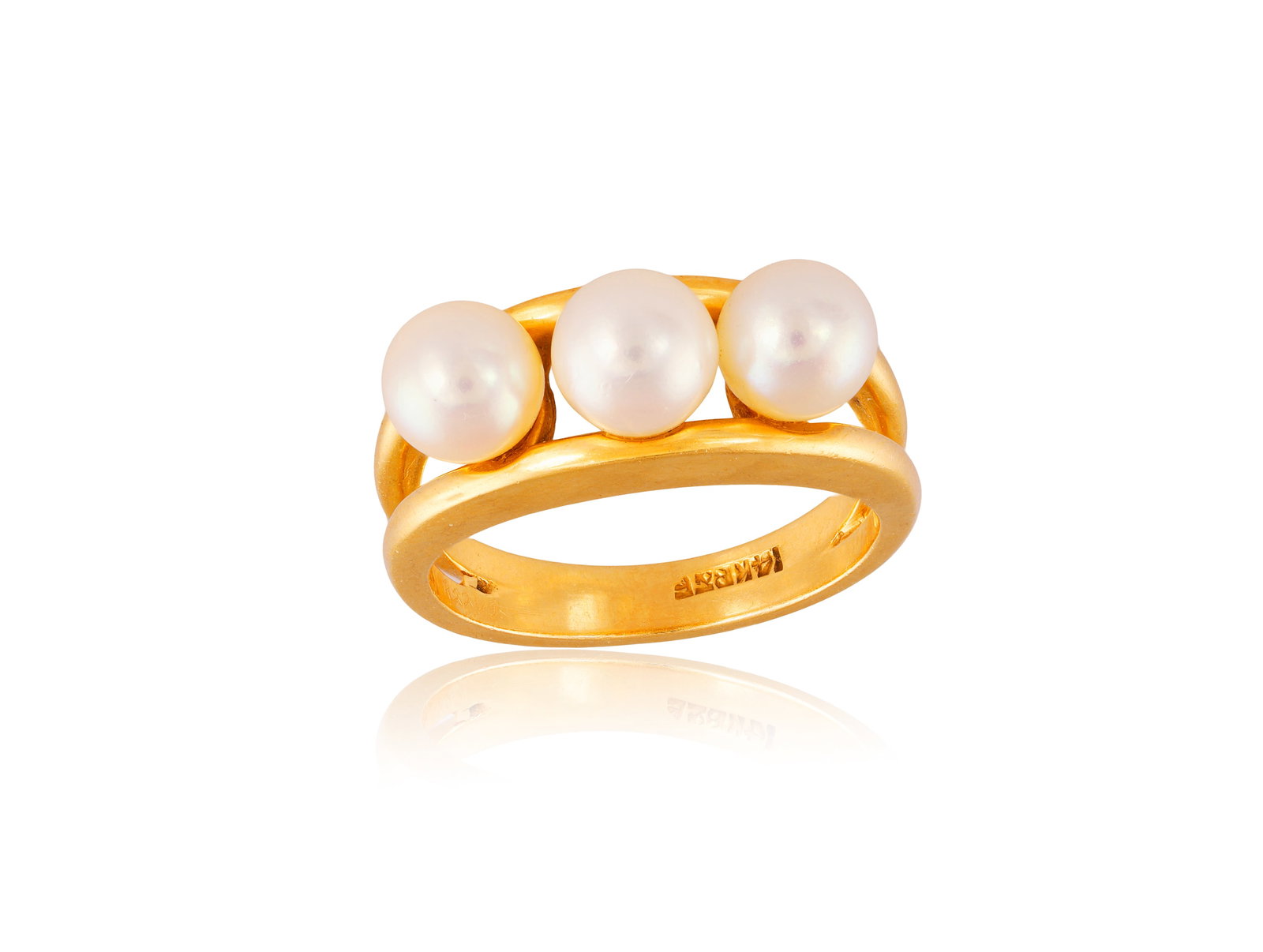 A CULTURED PEARL RING • Cultured pearls of white tint • mounted in 14K gold • ring: A CULTURED PEARL RING • Cultured pearls of white tint • mounted in 14K gold • ring size K⅔ *This lot is sold without a reserve
