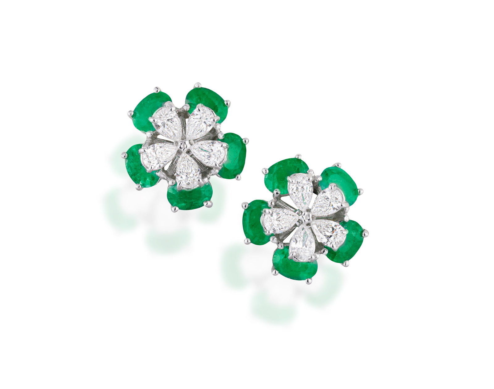 A PAIR OF EMERALD AND DIAMOND FLOWER EARRINGS • Pear-shaped diamonds, approx. 0.50ct total  (1 of 2)