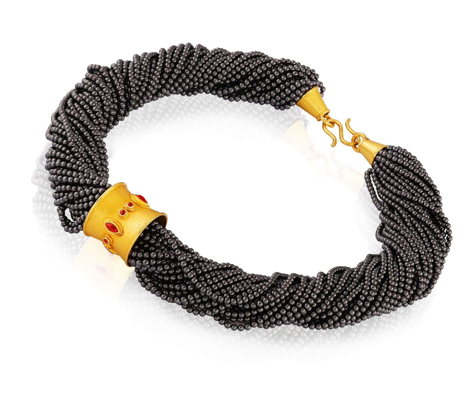 AN HEMATITE TORSADE NECKLACE • Multiple strings of hematite beads • marquise-shaped cabo (1 of 4)