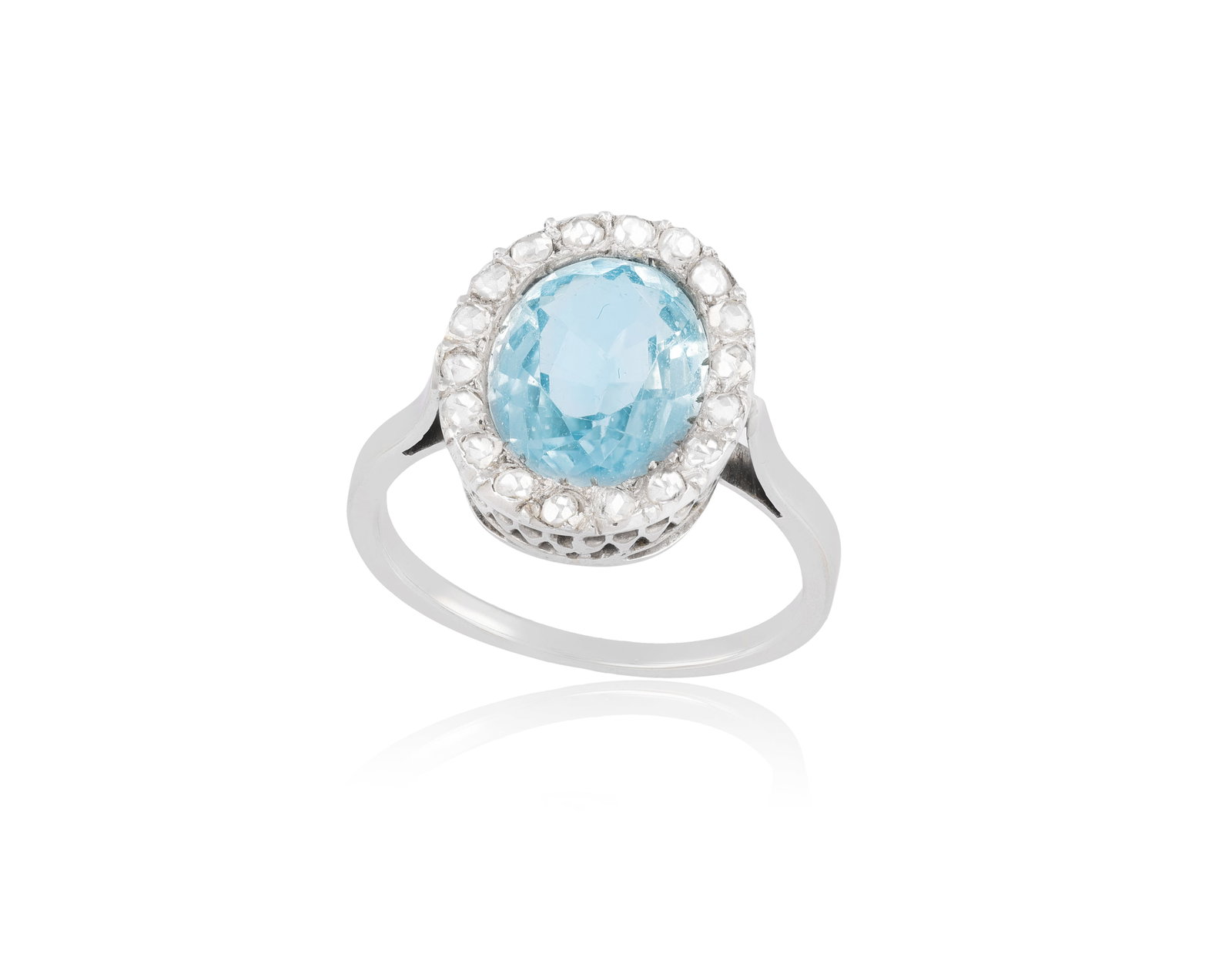 A TOPAZ AND DIAMOND RING • Oval-shaped topaz, approx. 3.10cts • rose-cut diamonds • (1 of 3)