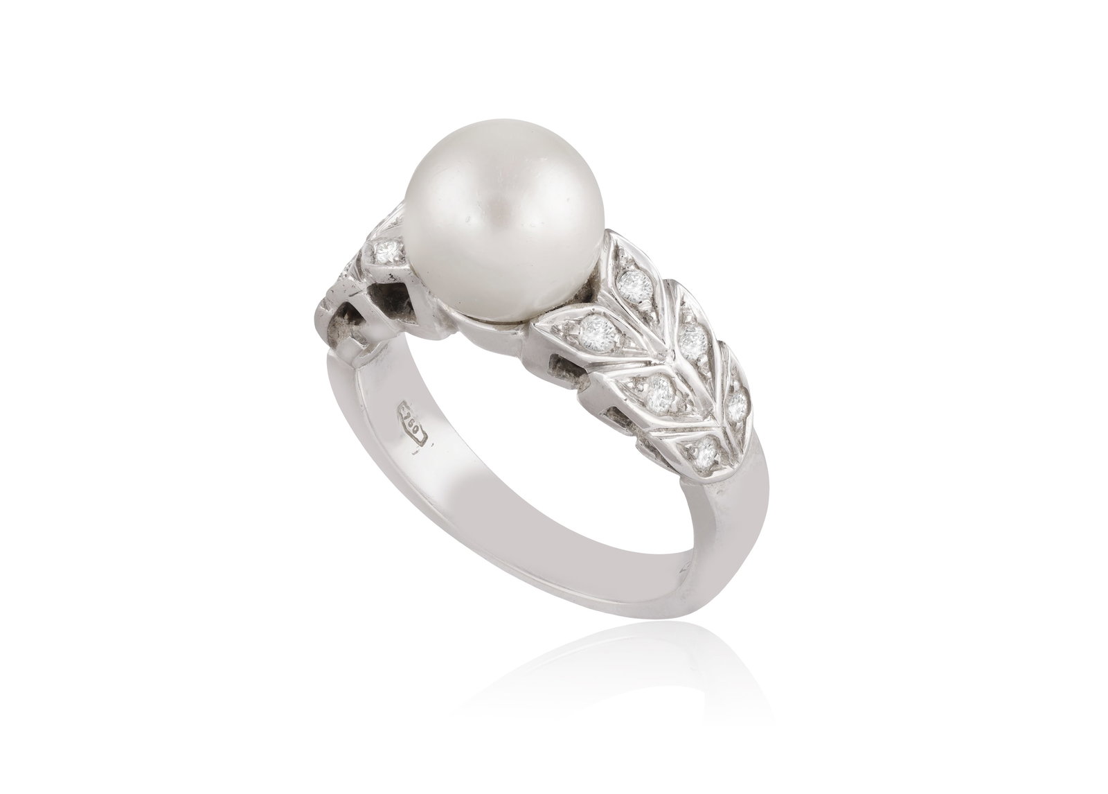 A CULTURED PEARL AND DIAMOND RING • A cultured pearl of white tint, approx. 9.4mm •: A CULTURED PEARL AND DIAMOND RING • A cultured pearl of white tint, approx. 9.4mm • brilliant-cut diamonds • mounted in 18K gold • ring size Q