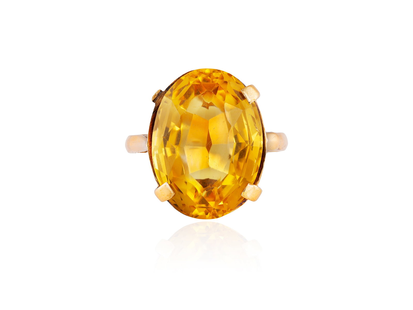 A CITRINE RING • Oval-shaped citrine, approx. 12.60cts • mounted in 9K gold • ring (1 of 3)