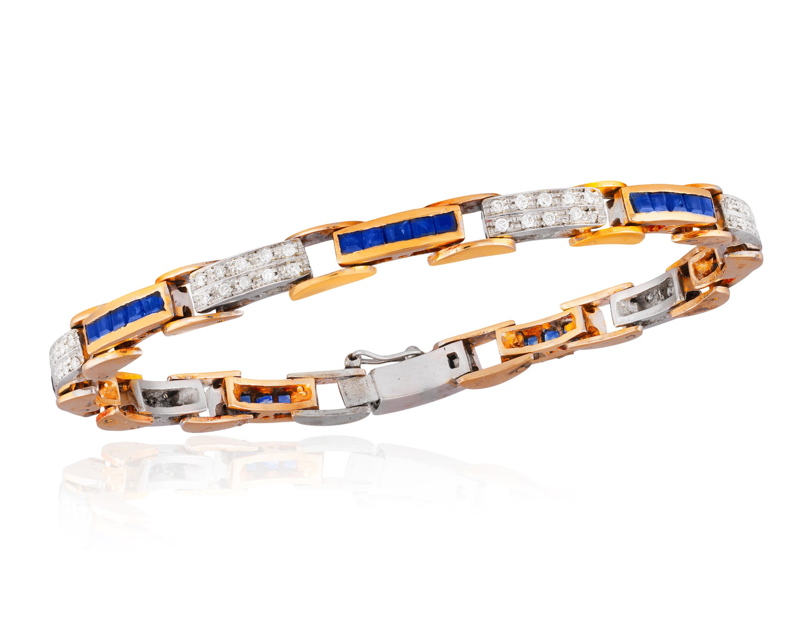 A SAPPHIRE AND DIAMOND BRACELET • Calibré-cut sapphires, approx. 2.50cts total • br (1 of 2)
