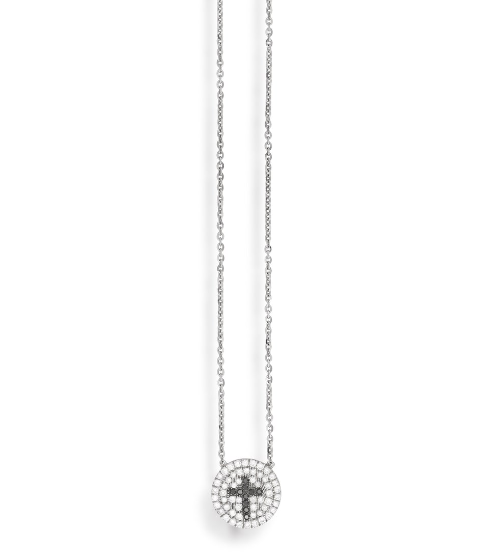 A DIAMOND AND SAPPHIRE PENDANT NECKLACE • Brilliant-cut diamonds • circular-cut sapphire (1 of 2)