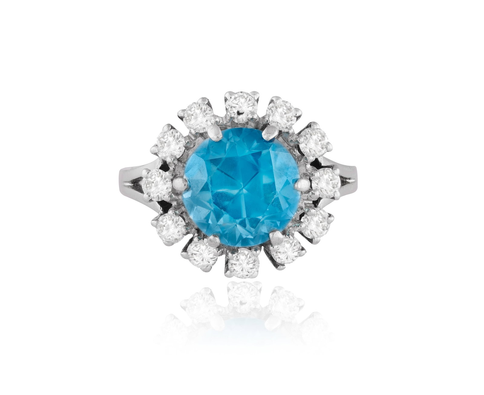 A ZIRCON AND DIAMOND DRESS RING • Circular-cut zircon, approx. 5.80cts • brilliant-cut (1 of 3)