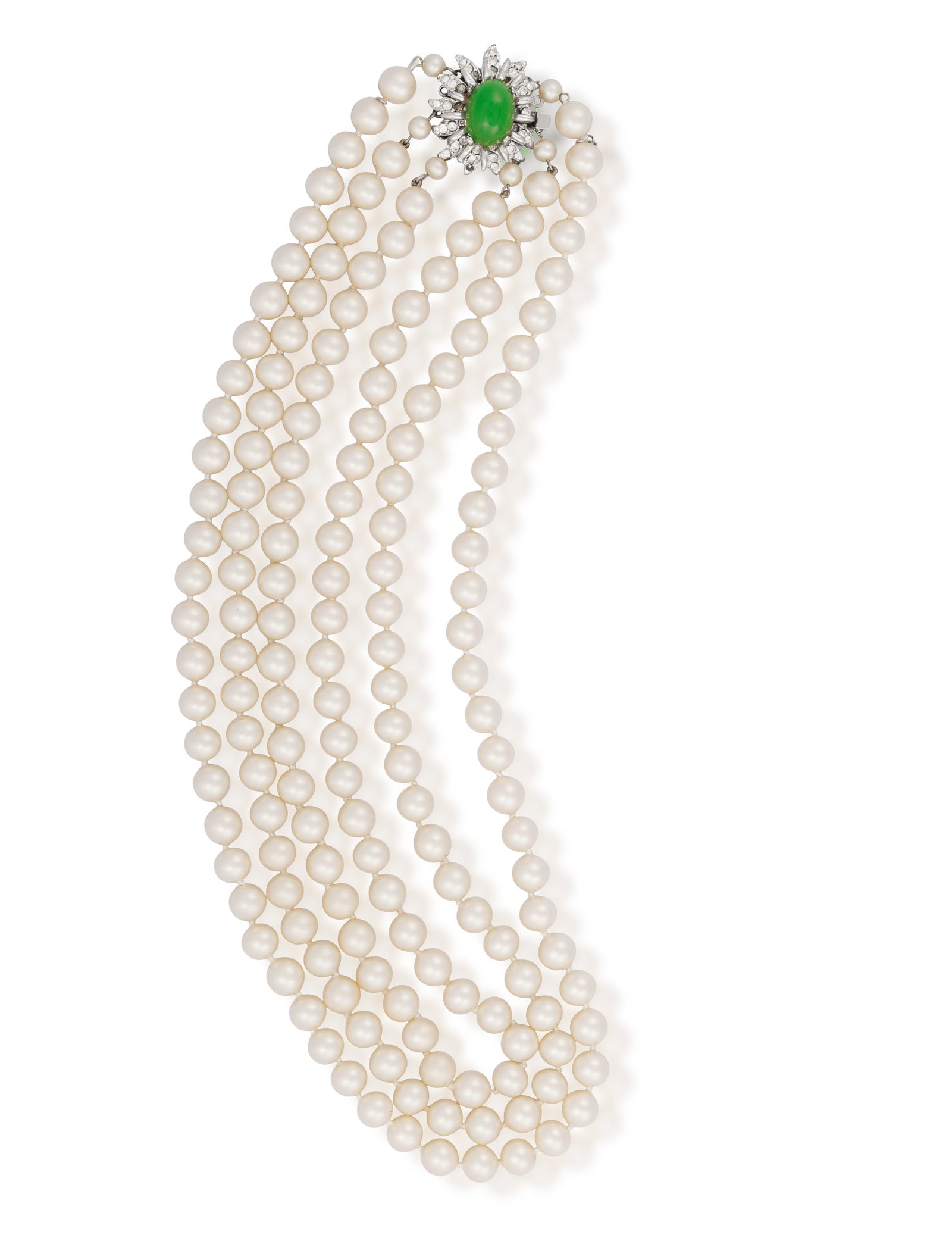 A CULTURED PEARL AND IMITATION STONE NECKLACE • Three strands of cultured pearls of cream tint (1 of 3)