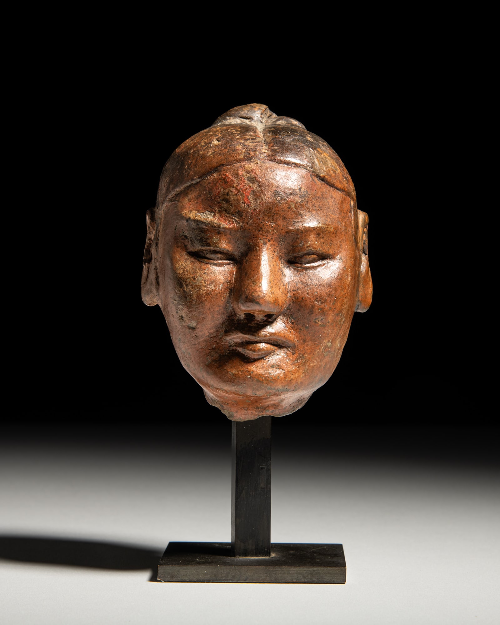 A POLYCHROMED TERROCOTA HEAD 汉代 彩陶头俑 China, Han (1 of 3)
