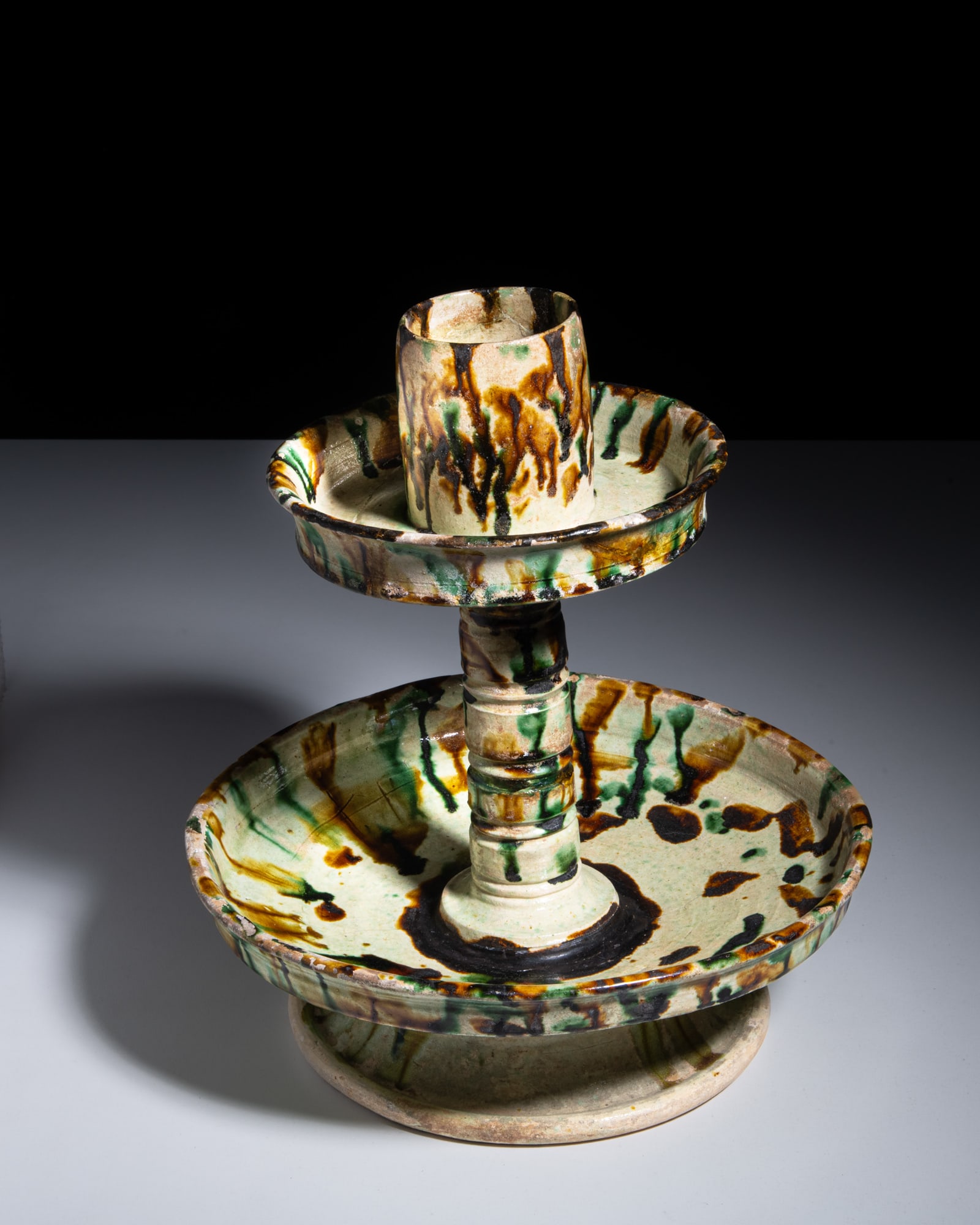 A VERY RARE SANCAI AMBER, GREEN AND CREAM-GLAZED POTTERY CANDLESTICK 唐代 三 (1 of 8)