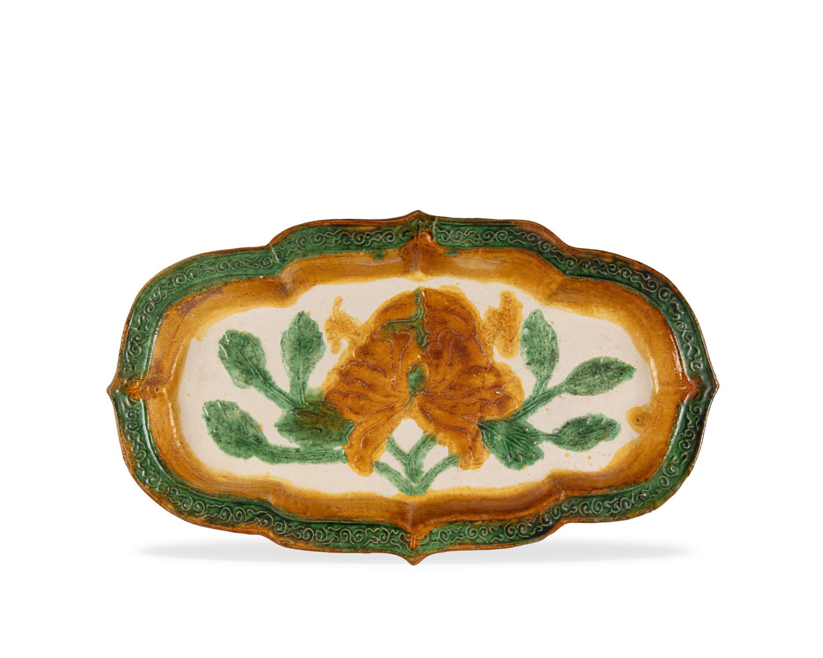 A SANCAI-GLAZED BEGONIA-SHAPED DISH 辽代 三彩印牡丹 (1 of 2)