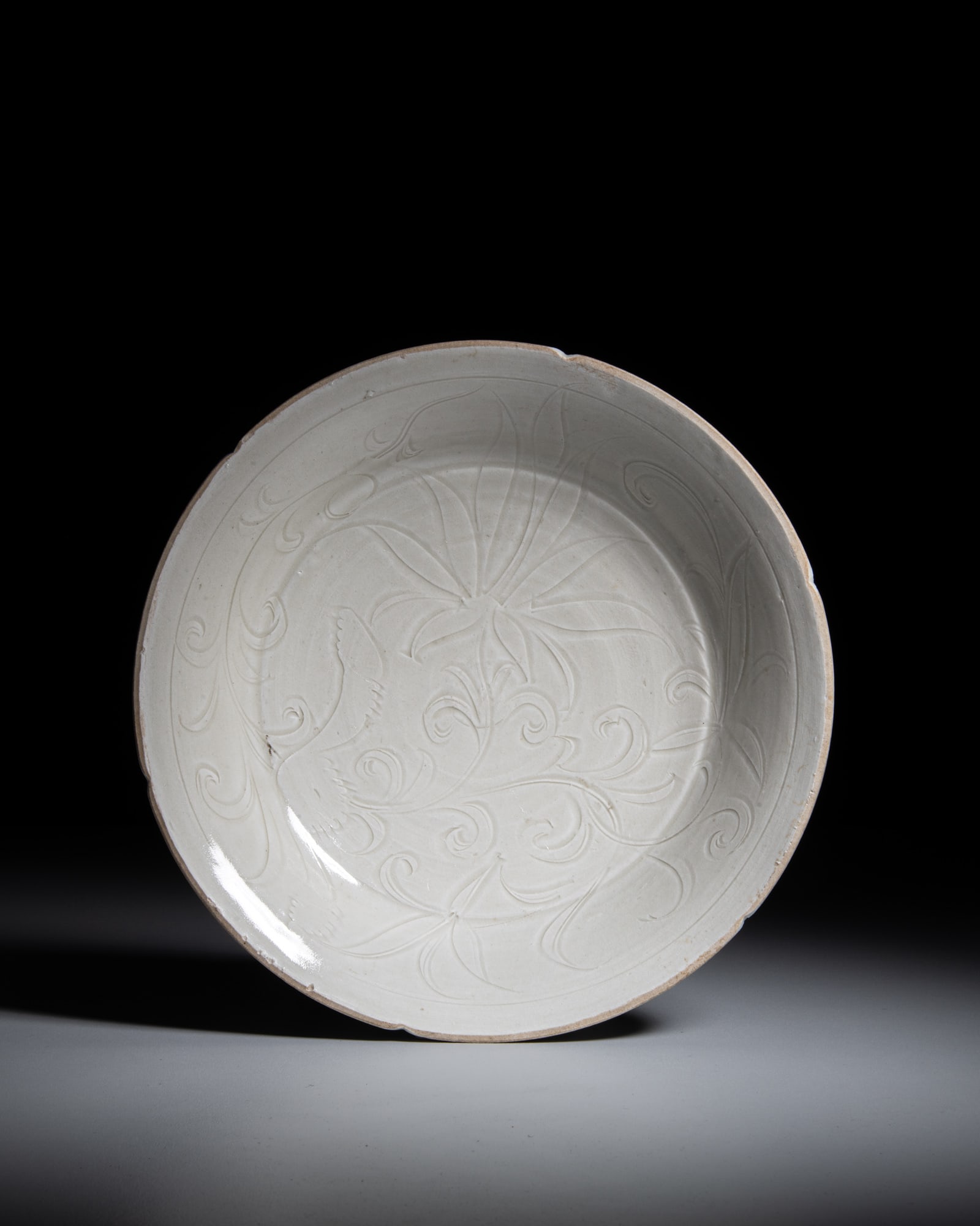 A VERY RARE WHITE GLAZED CARVED 'FLOWER' LOBED DISH 北宋 定窑划 (1 of 5)