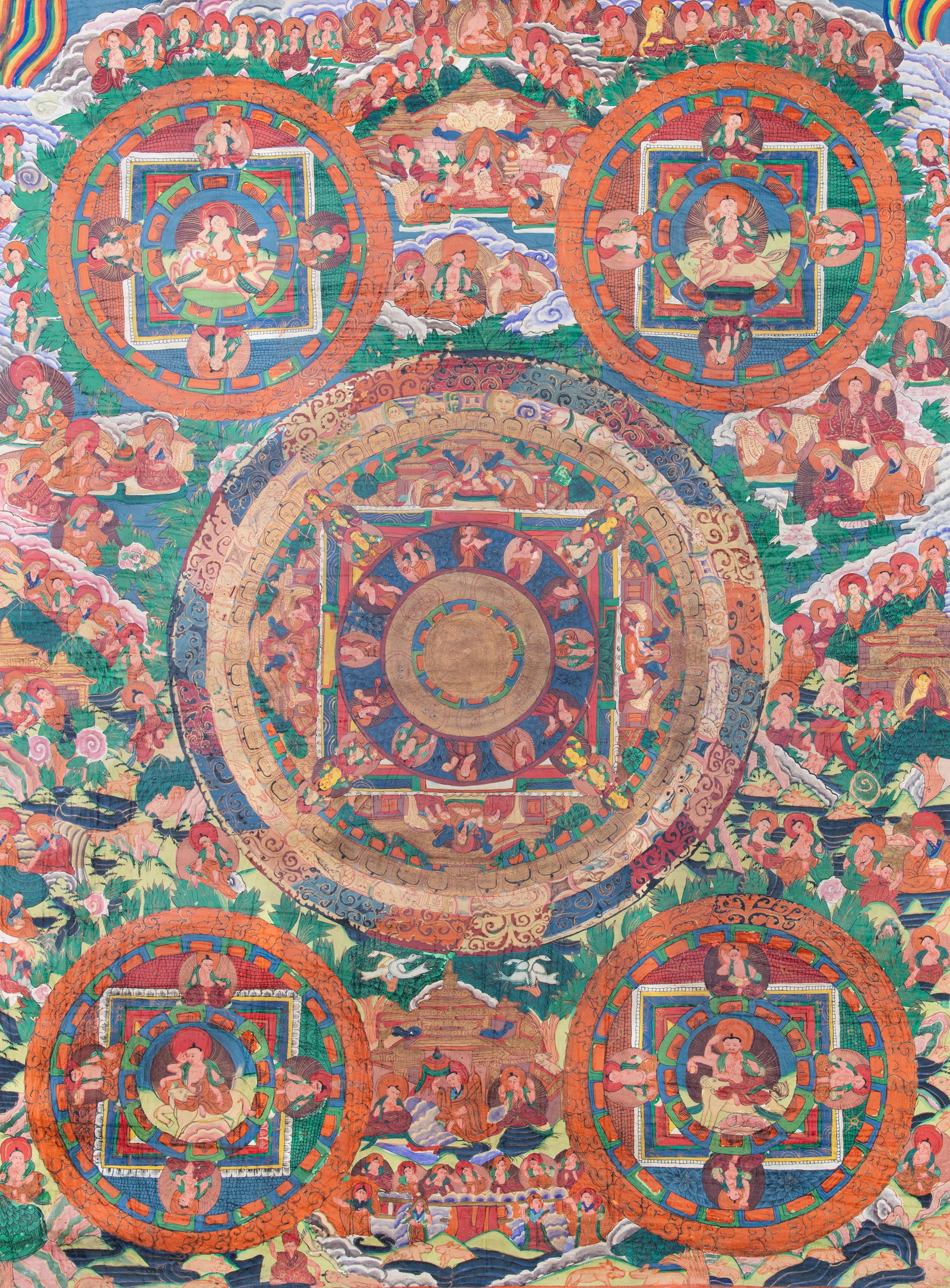 A POLYCHROME THANGKA ON CLOTH DEPICTING THE MANDALA OF WRATHFUL PADMASAMBHAVA ON A TIGER, SURROUNDED (1 of 4)