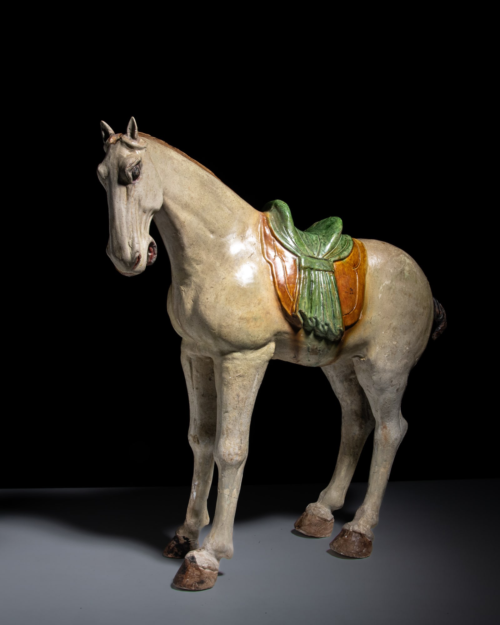A LARGE SANCAI-GLAZED POTTERY HORSE 唐代 三彩马 China, Tang dynasty (1 of 4)