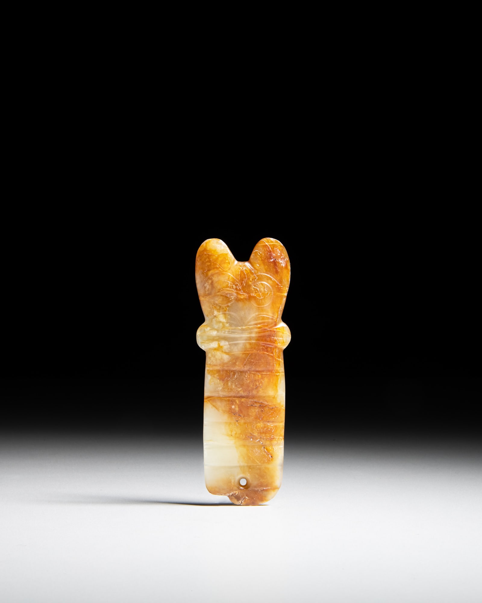 A FINE AND RARE YELLOW JADE 'SHAMANIC' Y-SHAPED PLAQUE 红山文化 黃 (1 of 2)