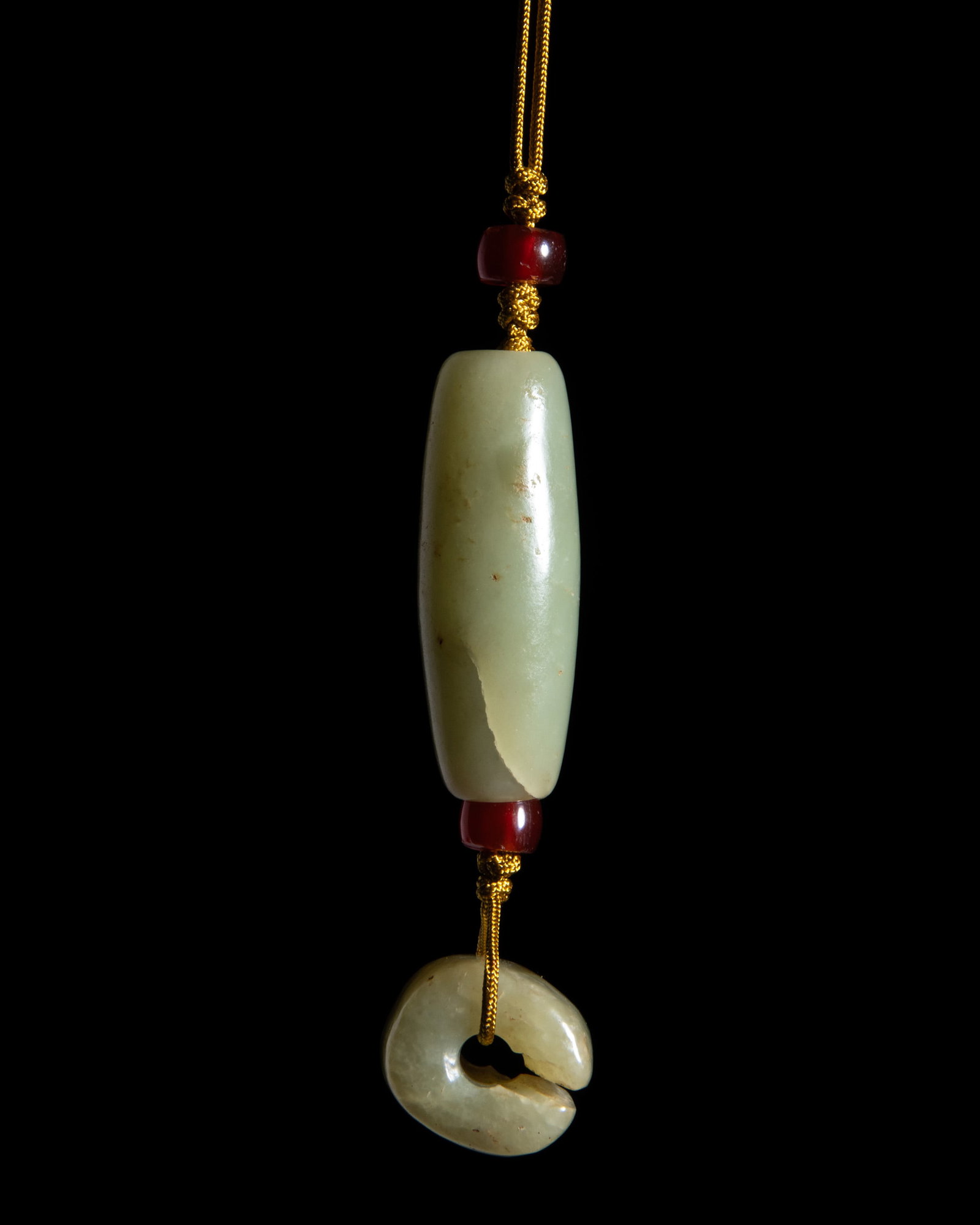 A STRING COMPOSED OF TWO CELADON JADE BEADS AND TWO RED AGATE BEADS 红山文化 (1 of 1)