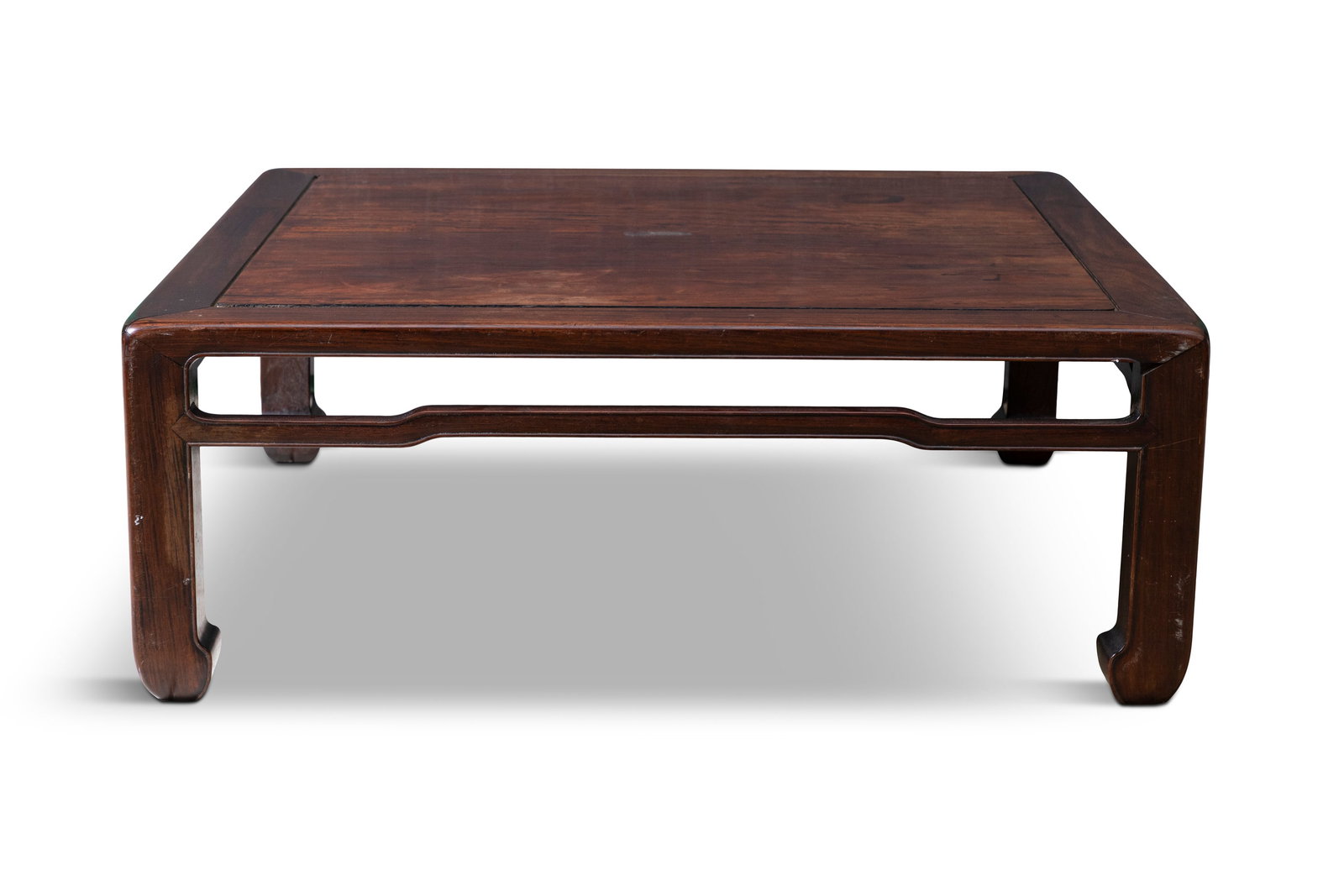 A CHINESE HARDWOOD SQUARE LOW TABLE China, 20th century with solid paneled top and wavy stretcher: A CHINESE HARDWOOD SQUARE LOW TABLE China, 20th century with solid paneled top and wavy stretcher rail. On squared legs with inverted feet D.34 × 89.5 × 89.5 cm