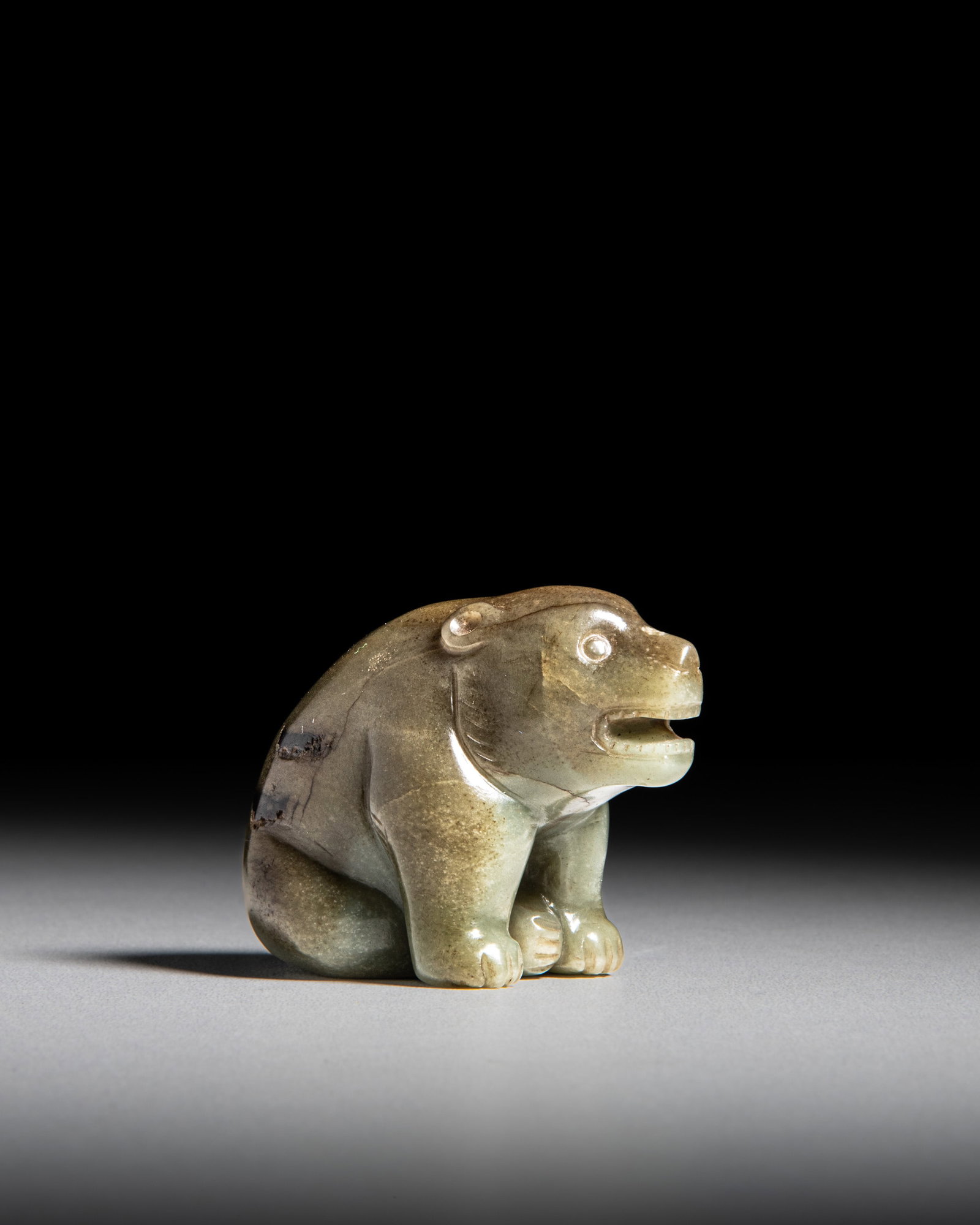 A GREYISH AND BROWN RUSSET JADE BEAR 汉代风格 青灰玉 (1 of 4)