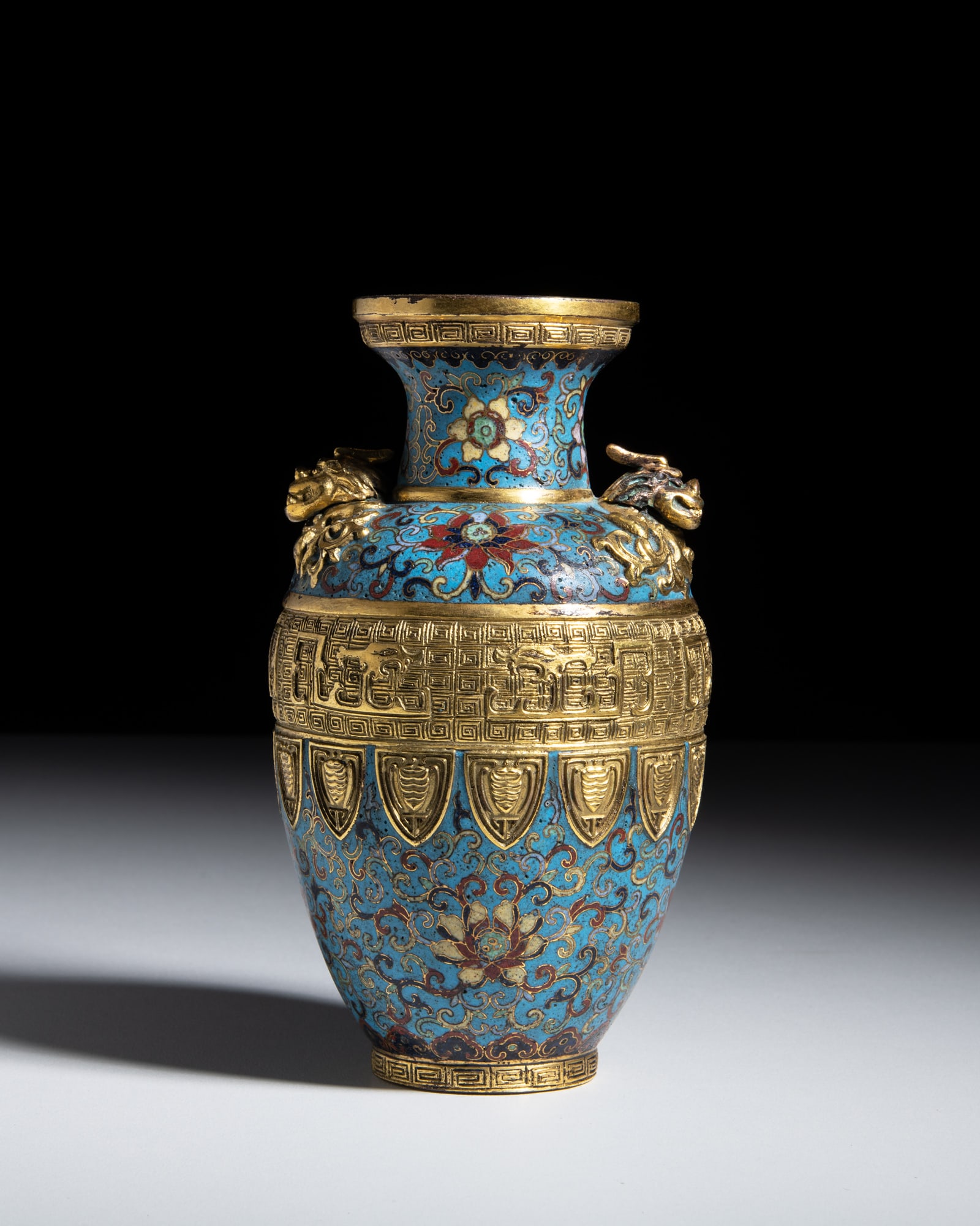 A BRONZE CLOISONNÉ ENAMEL ‘LOTUS’ ARCHAISTIC DRAGON VASE, MARK AND PERIOD OF (1 of 3)