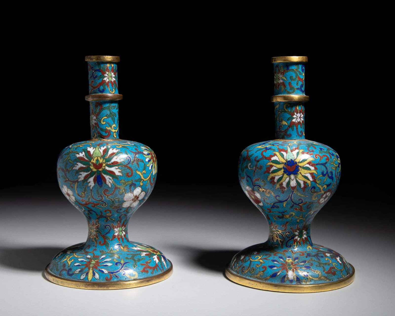 A PAIR OF GILT-BRONZE AND CLOISONNÉ ENAMEL ‘LOTUS’ HOLY WATER VASES, QIANLONG MARK (1 of 4)