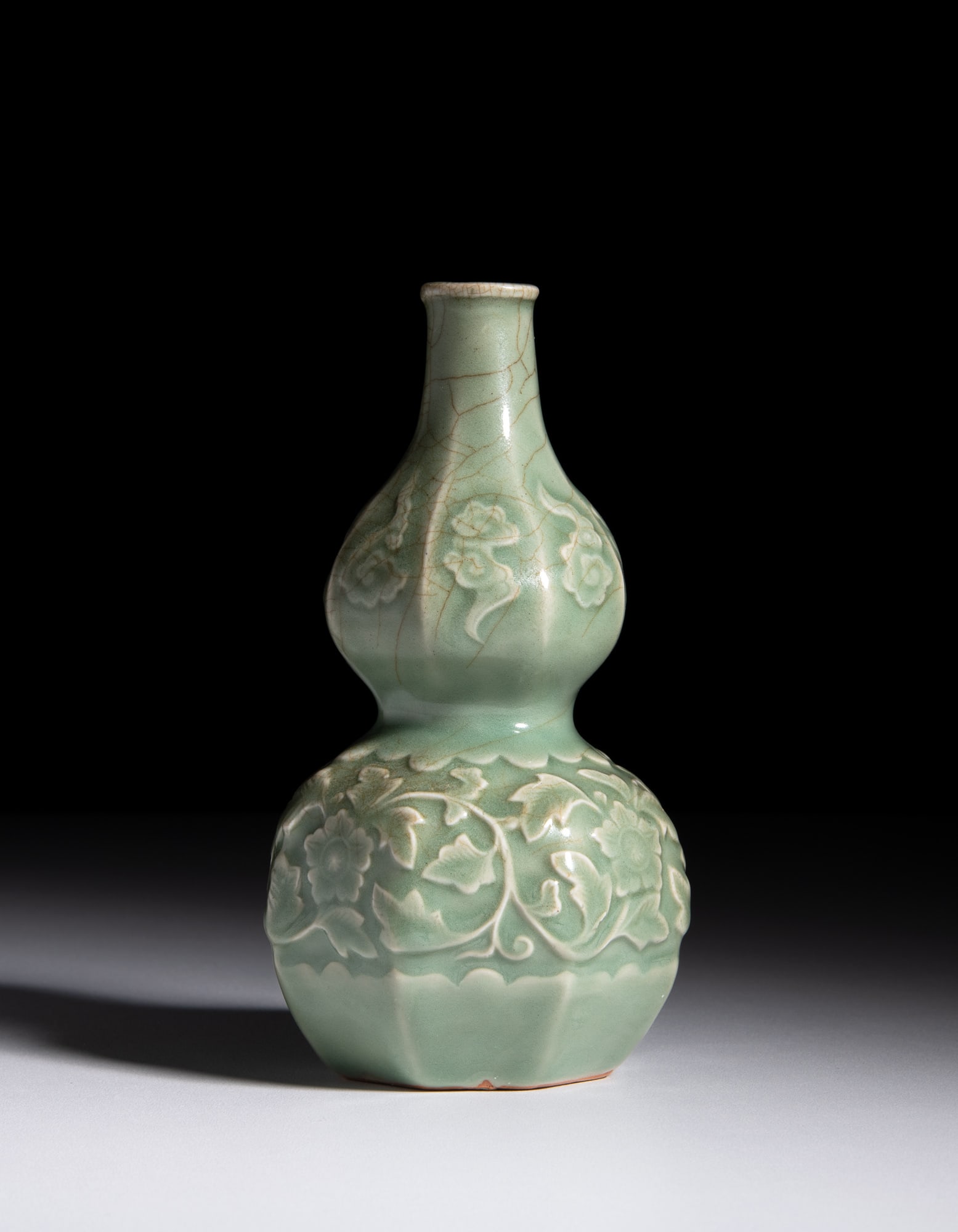 A LONGQUAN CELADON DOUBLE GOURD VASE 元代 龙泉模印瓜 (1 of 2)