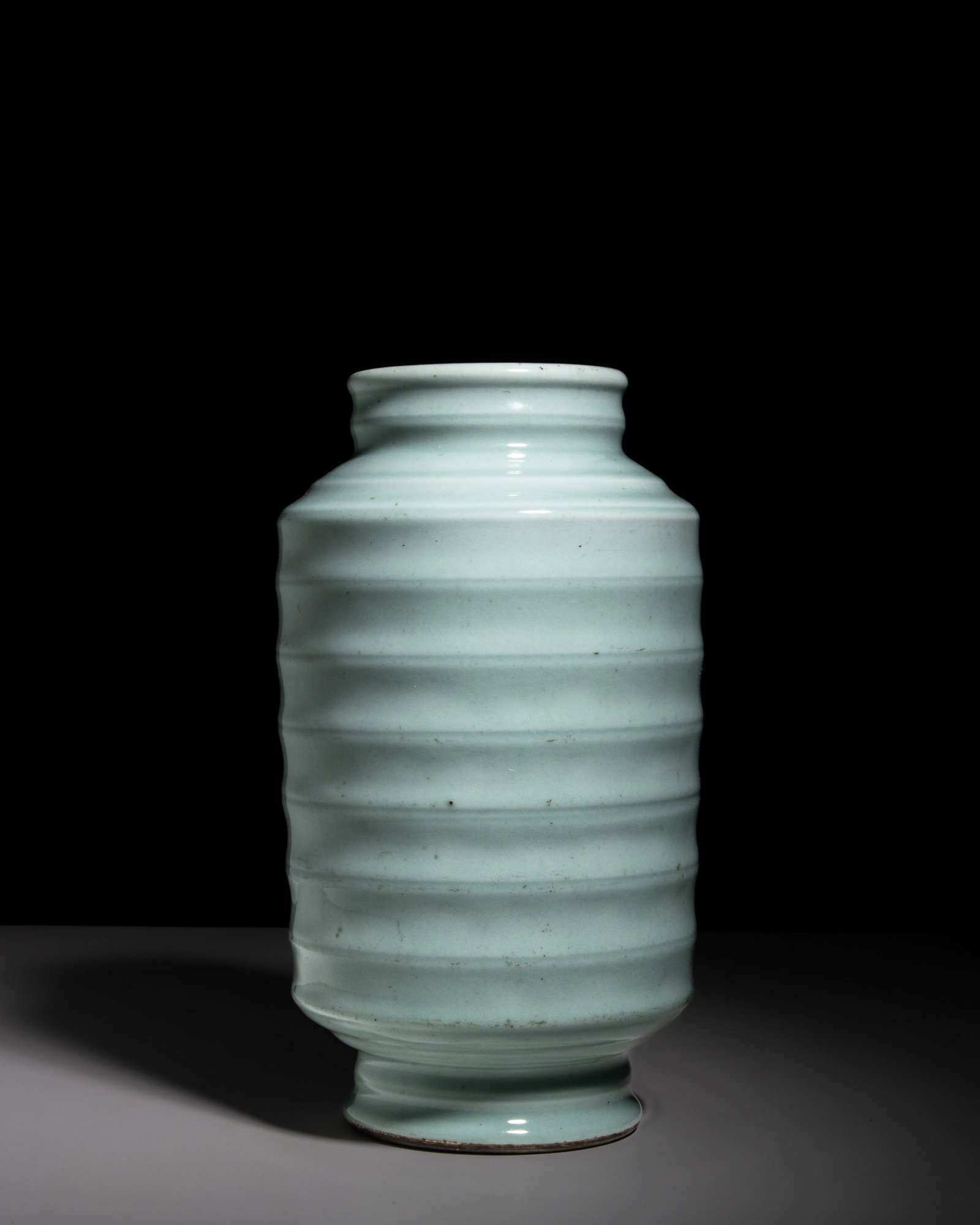 A RARE AND MAGNIFICENT LONGQUAN-TYPE CELADON-GLAZED 'BAMBOO-SHAPED' ARCHAIC STRING CYLINDRICAL VASE (1 of 4)