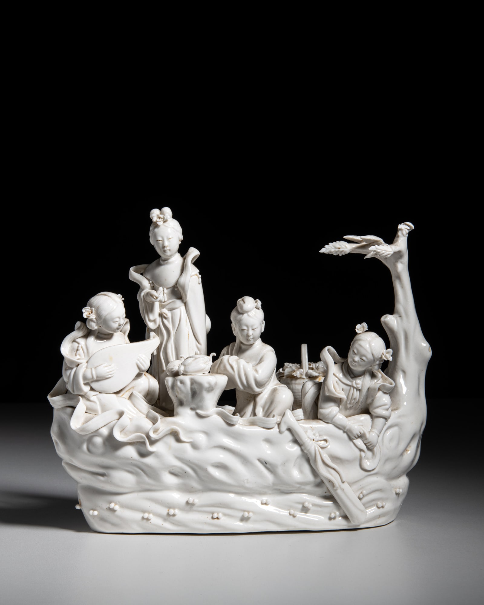 A BLANC-DE-CHINE GROUP OF ‘IMMORTALS BOATING TO HEAVEN’ 20世纪下: A BLANC-DE-CHINE GROUP OF ‘IMMORTALS BOATING TO HEAVEN’ 20世纪下半叶 德化仙女过海雕瓷 China, second half of