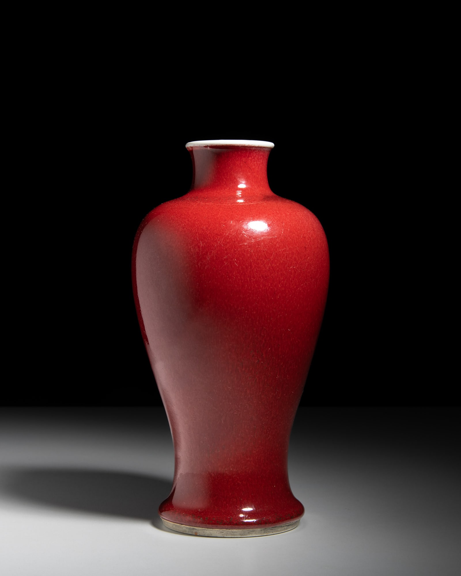 A RARE RED-GLAZE 'LANGYAO' MEIPING VASE 清18世纪 郎窑红釉 (1 of 3)