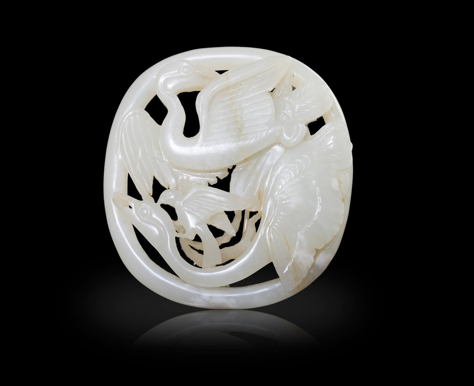 A CELADON JADE RETICULATED 'GOOSE AND HAWK' BELT BUCKLE 清代 青玉透 (1 of 5)