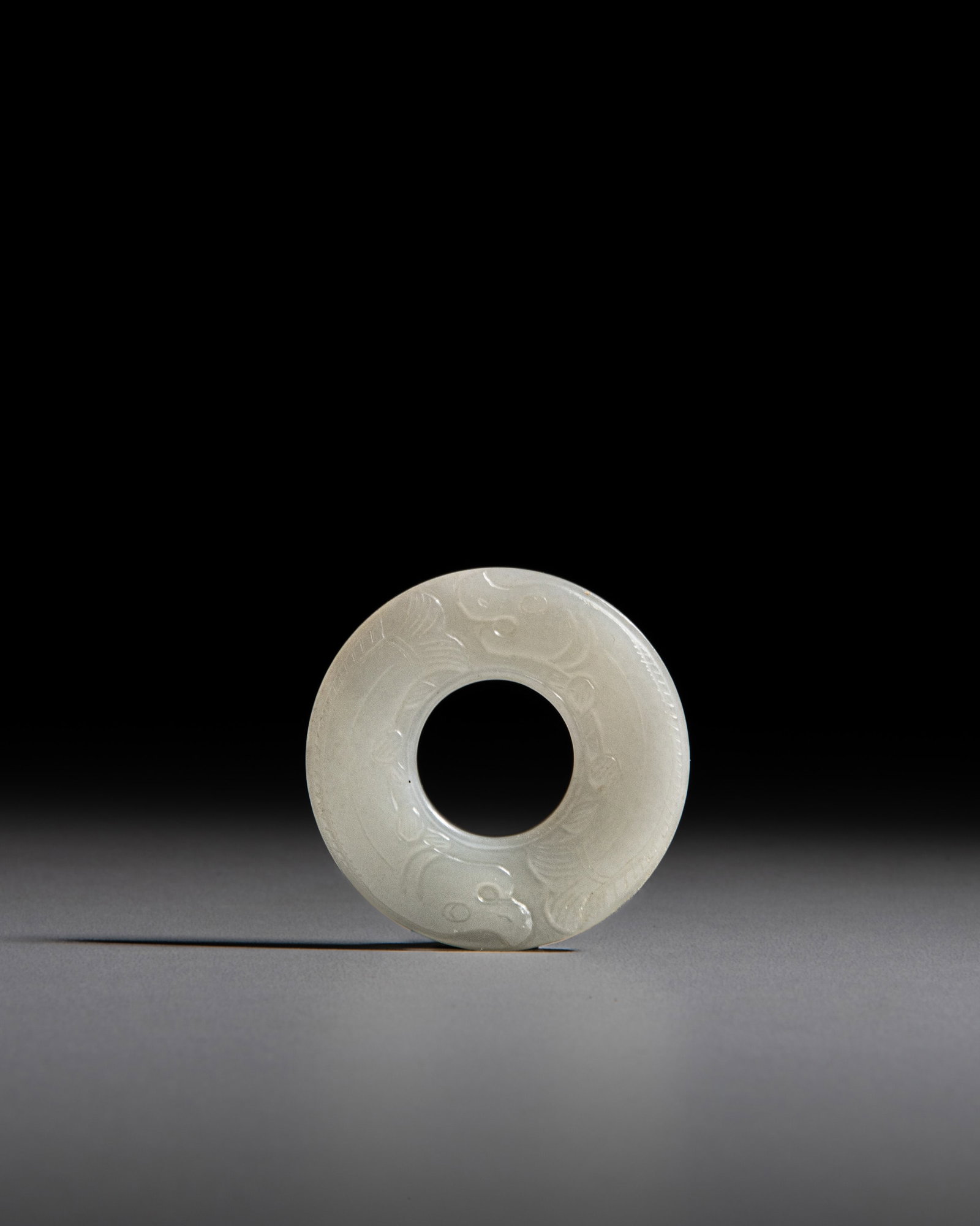 A WHITE JADE 'DOUBLE FISH' HUAN SHAPE PENDANT 清代 白玉双鱼 (1 of 4)