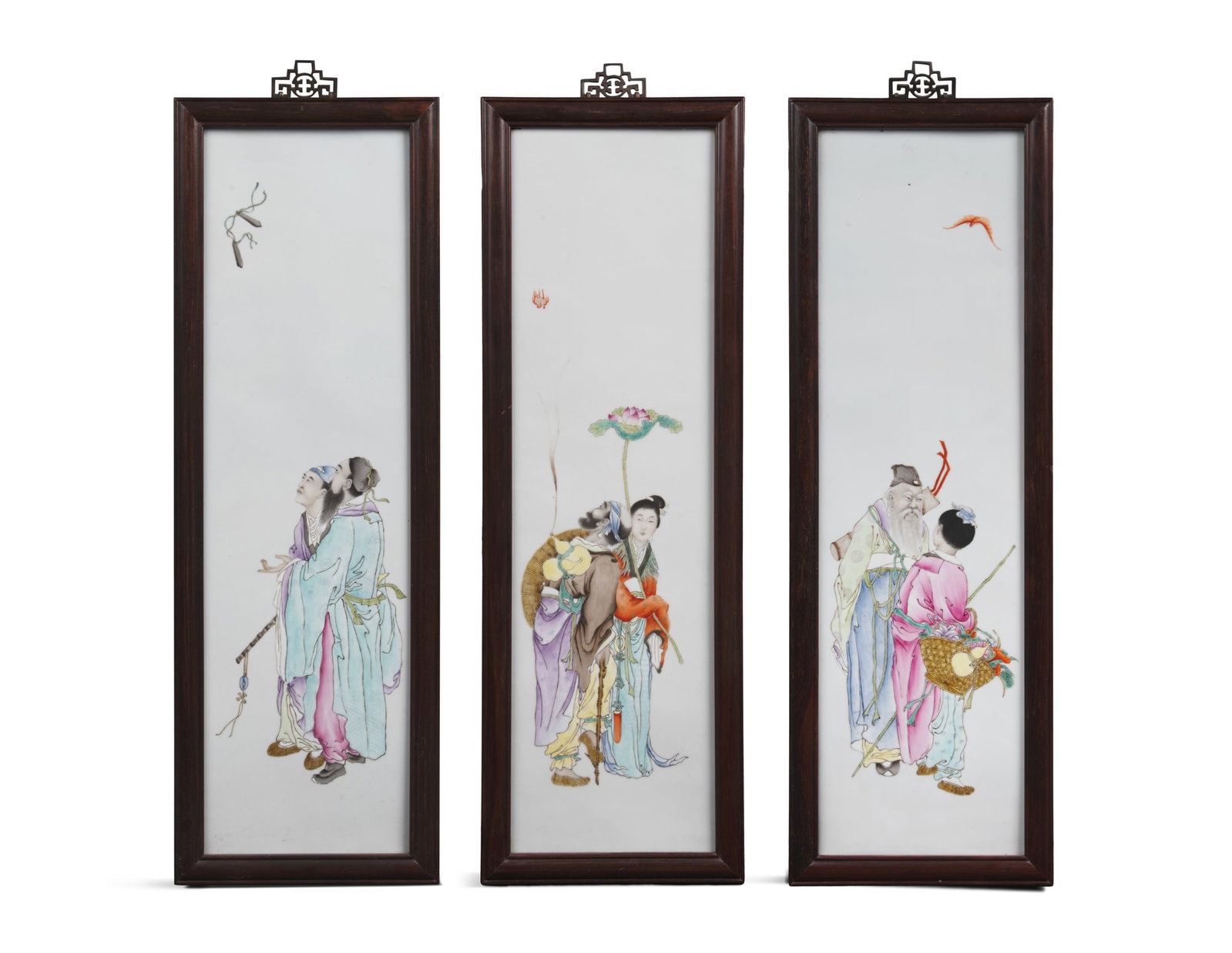 WANG QI (1884-1937) SCHOOL A set of three famille rose 'immortals' plaques, with wooden frames (1 of 4)