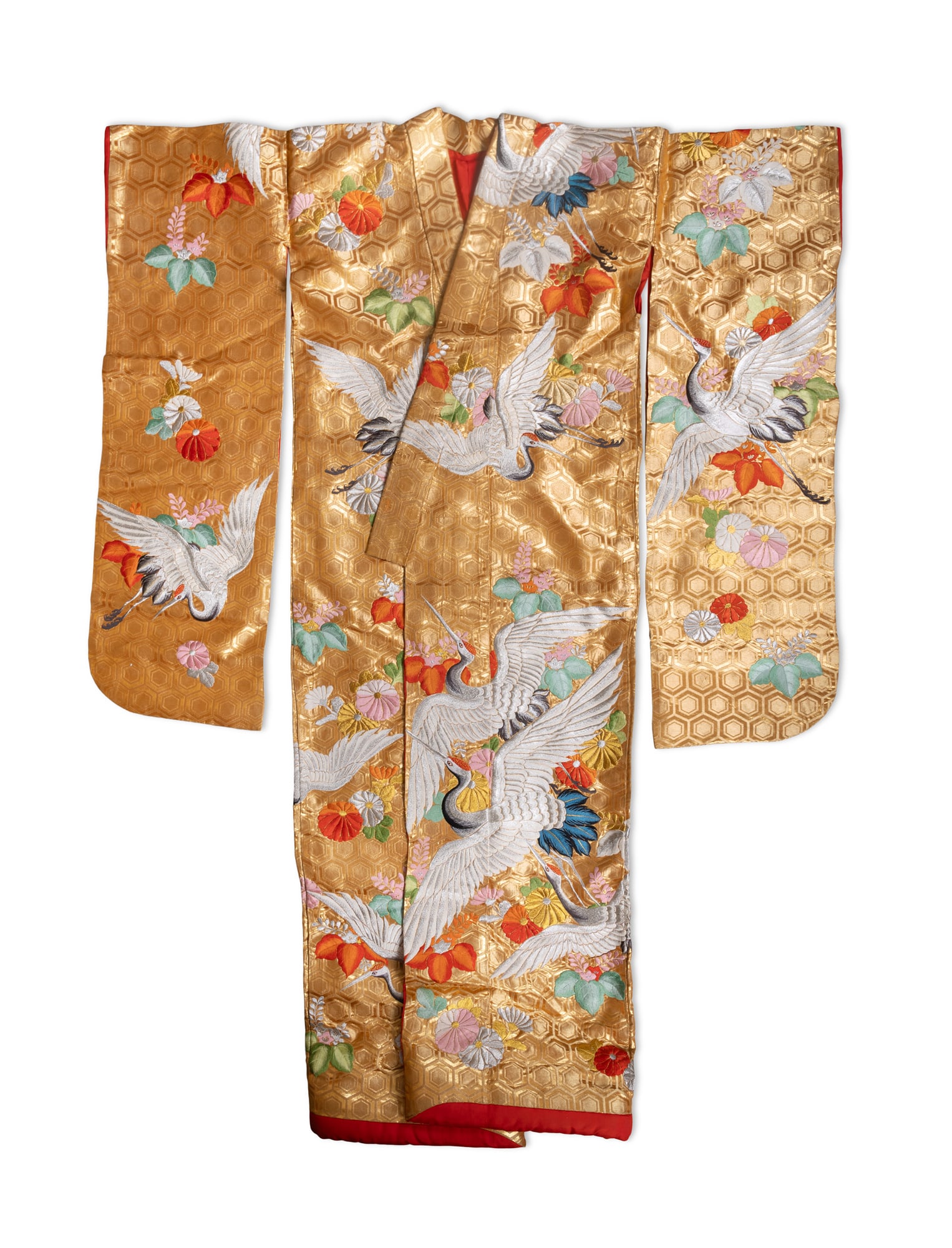 A JAPANESE GOLD-GROUND SILK UCHIKAKE Japan, mid-20th century, Shōwa period of traditional: A JAPANESE GOLD-GROUND SILK UCHIKAKE Japan, mid-20th century, Shōwa period of traditional form, woven with an all-over honeycomb-patterned gold brocade ground, richly embroidered in coloured silk