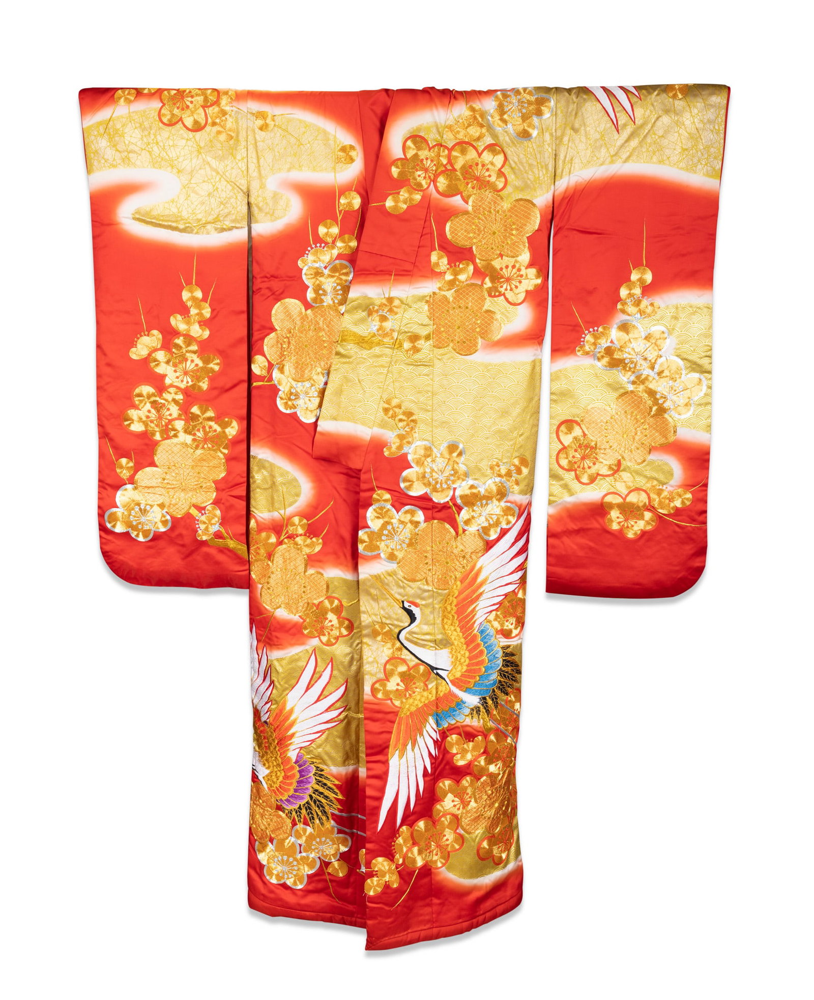 A JAPANESE RED-GROUND SILK UCHIKAKE Japan, mid-to-late 20th century, Shōwa period of: A JAPANESE RED-GROUND SILK UCHIKAKE Japan, mid-to-late 20th century, Shōwa period of traditional form, woven with a vivid red silk ground transitioning into white (shibori-style gradient), enrich