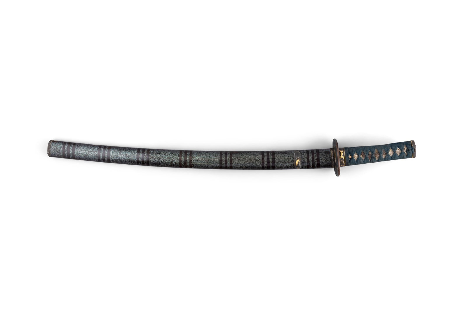 WAKIZASHI Japan, Shinto period. With a shinogi-zukuri blade, with two bohi (grooves), on each: WAKIZASHI Japan, Shinto period. With a shinogi-zukuri blade, with two bohi (grooves), on each side, one wide and short, the other long and thin; suguha hamon; not disassembled. The koshirae (mountings