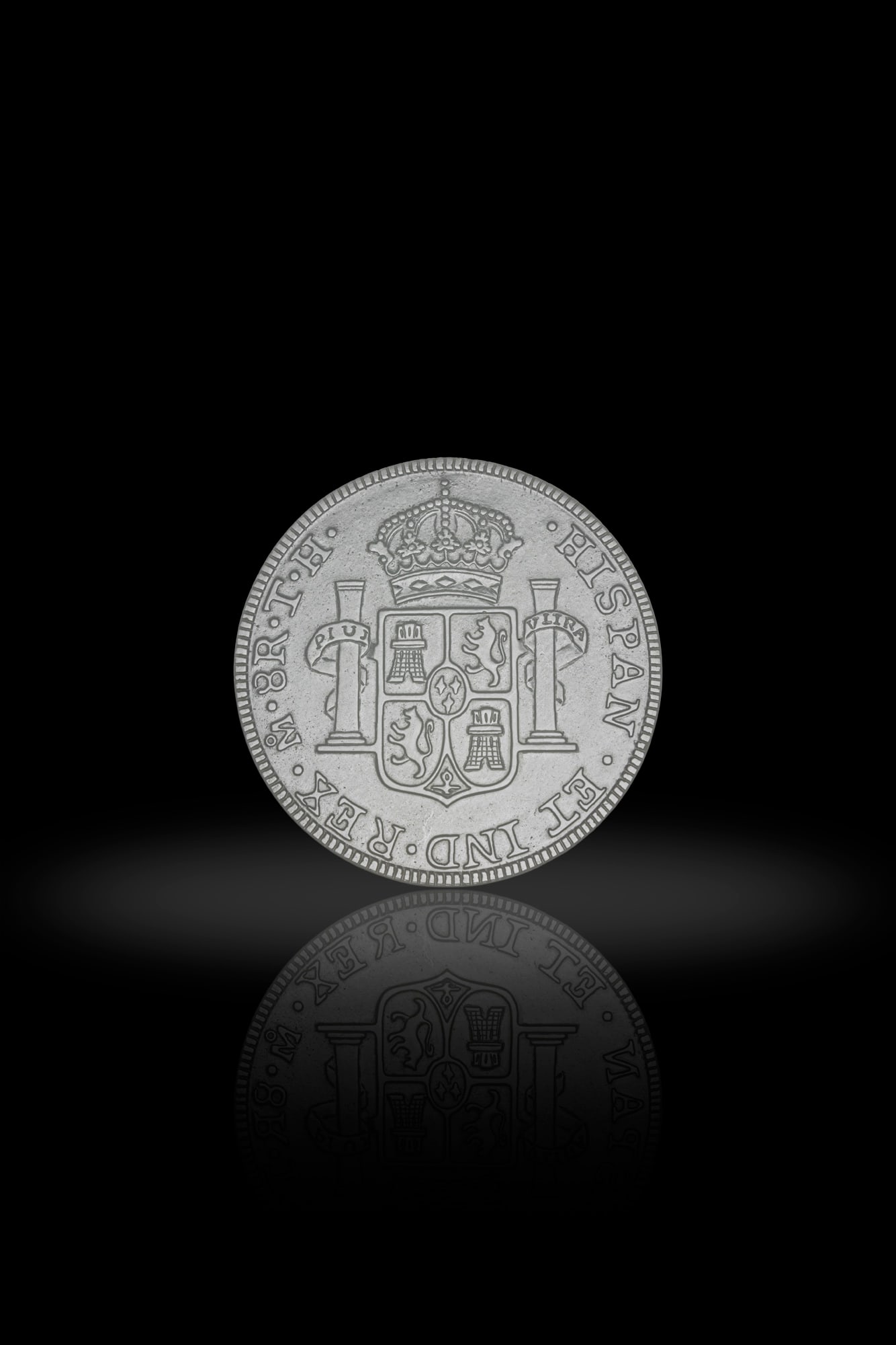 A WHITE JADE CARVING OF A SPANISH COIN 清 白玉雕卡洛斯 (1 of 2)