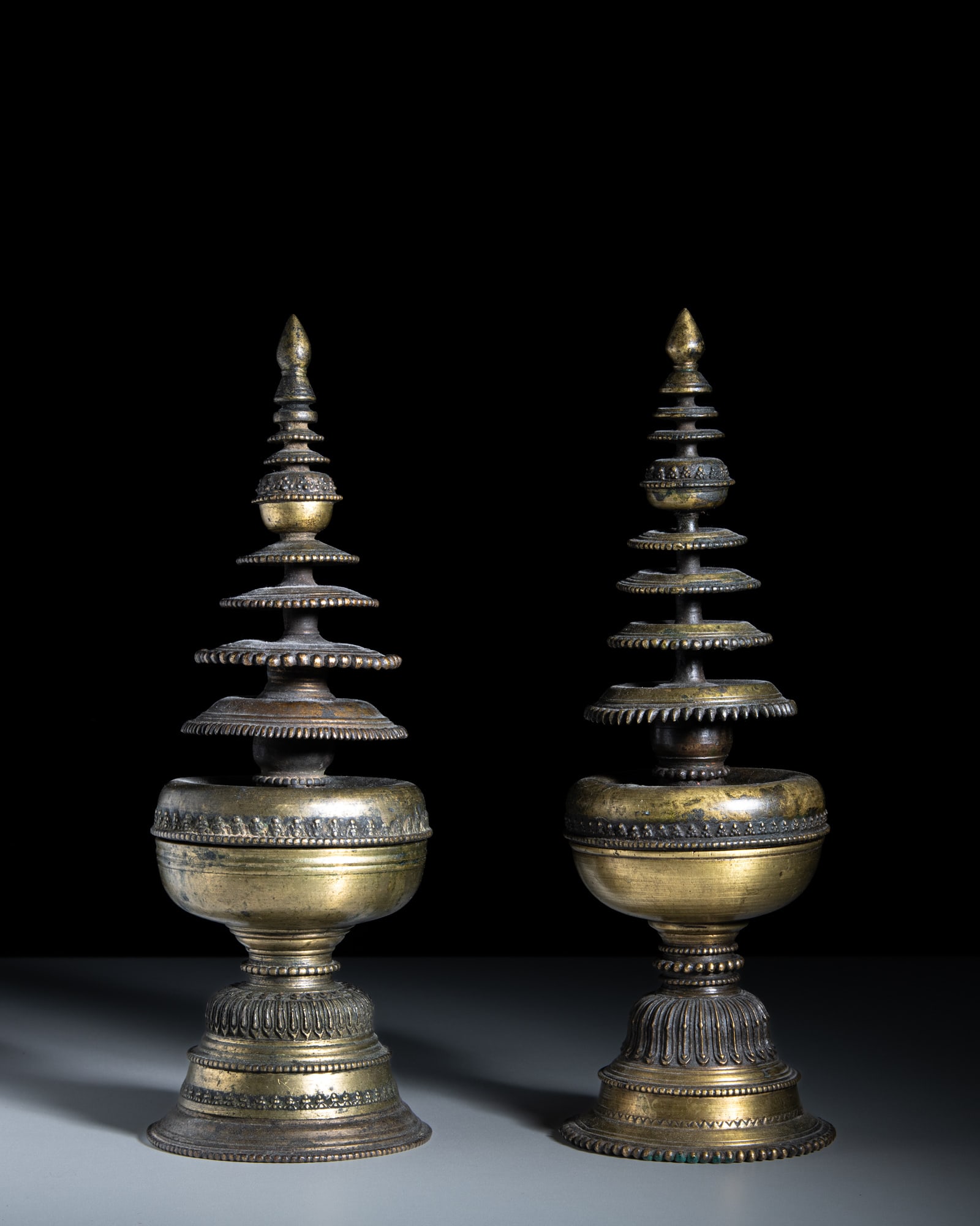 A PAIR OF STUPA SHAPED METAL CONTAINERS Nepal, 17th century H.34.8-35cm Note A similar (1 of 1)
