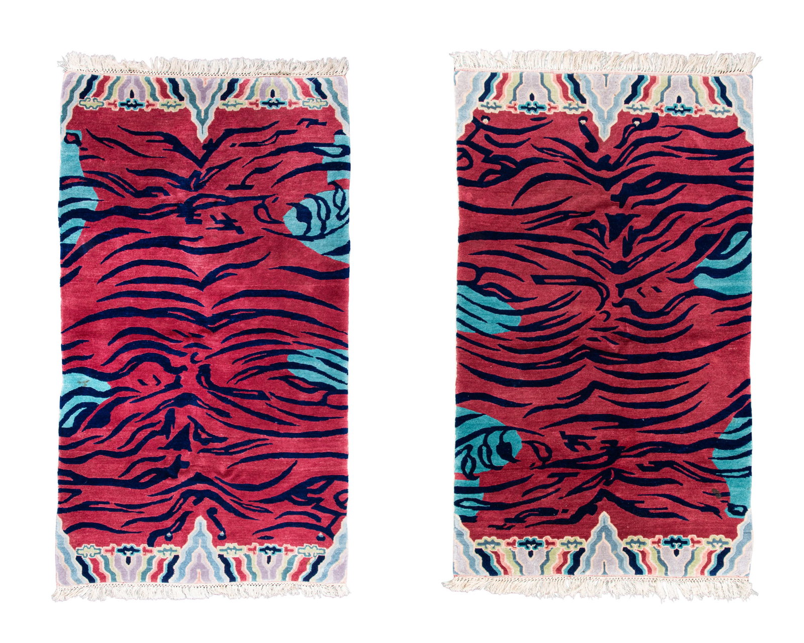 A RARE PAIR OF FUCHSIA AND TURQUOISE COLOURED TANTRIC ‘TIGER’ WOOL RUGS 西: A RARE PAIR OF FUCHSIA AND TURQUOISE COLOURED TANTRIC ‘TIGER’ WOOL RUGS 西藏 晚清 虎纹地毯一对 Tibet, late Qing dynasty Size.170