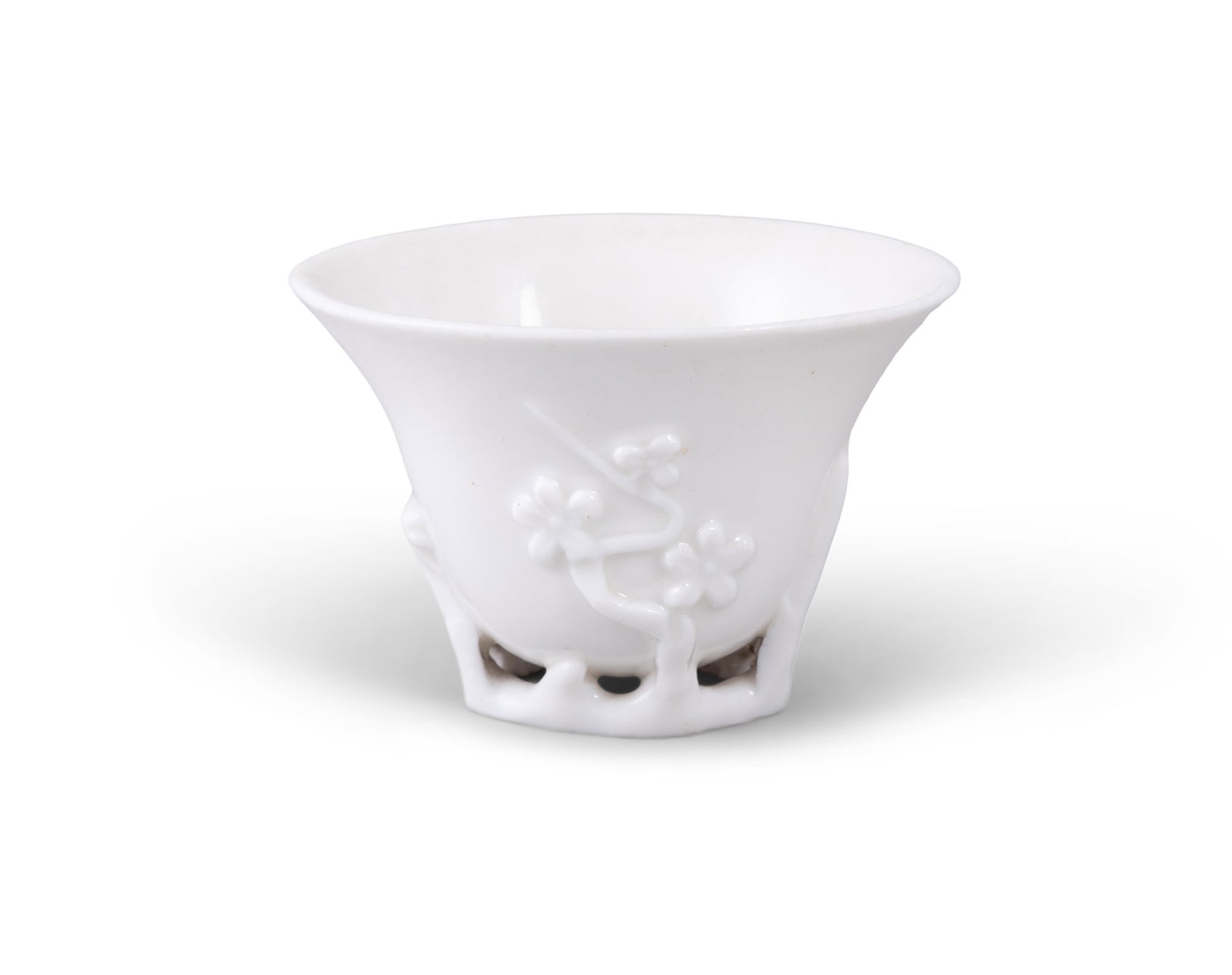 A BLANC DE CHINE PORCELAIN LIBATION CUP, Quing Dynasty, shaped in the form of a rhinoceros (1 of 4)